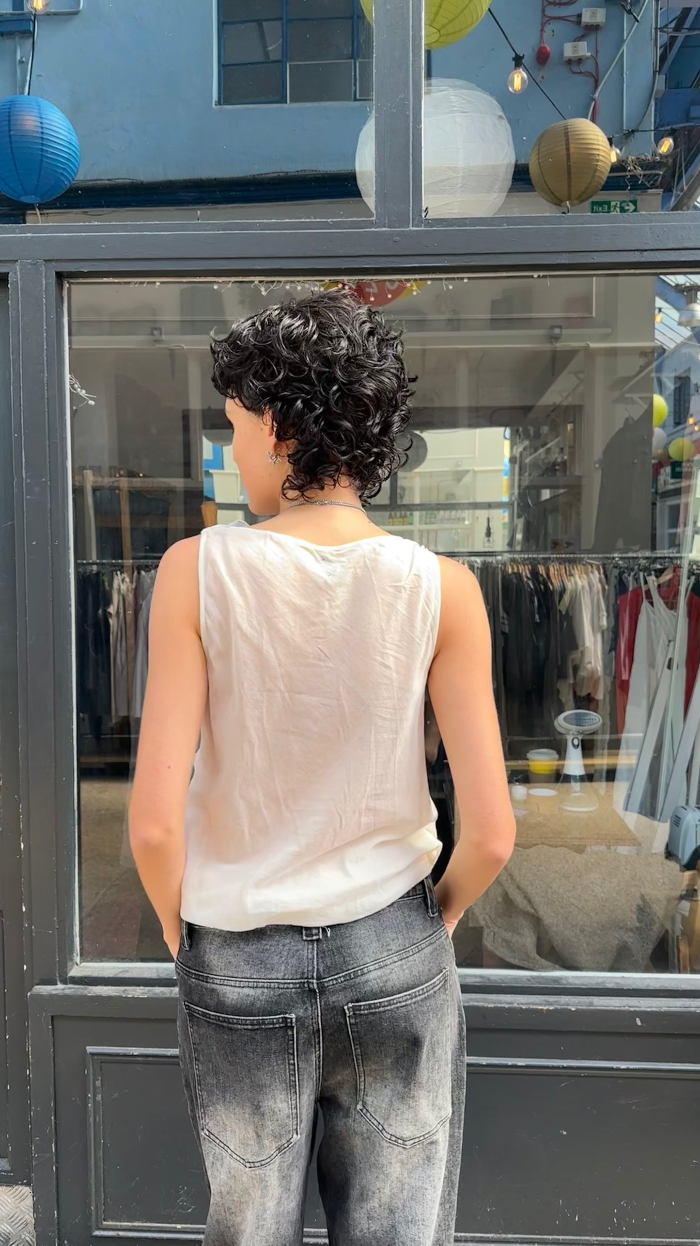 Cream ruffle sleeveless vest