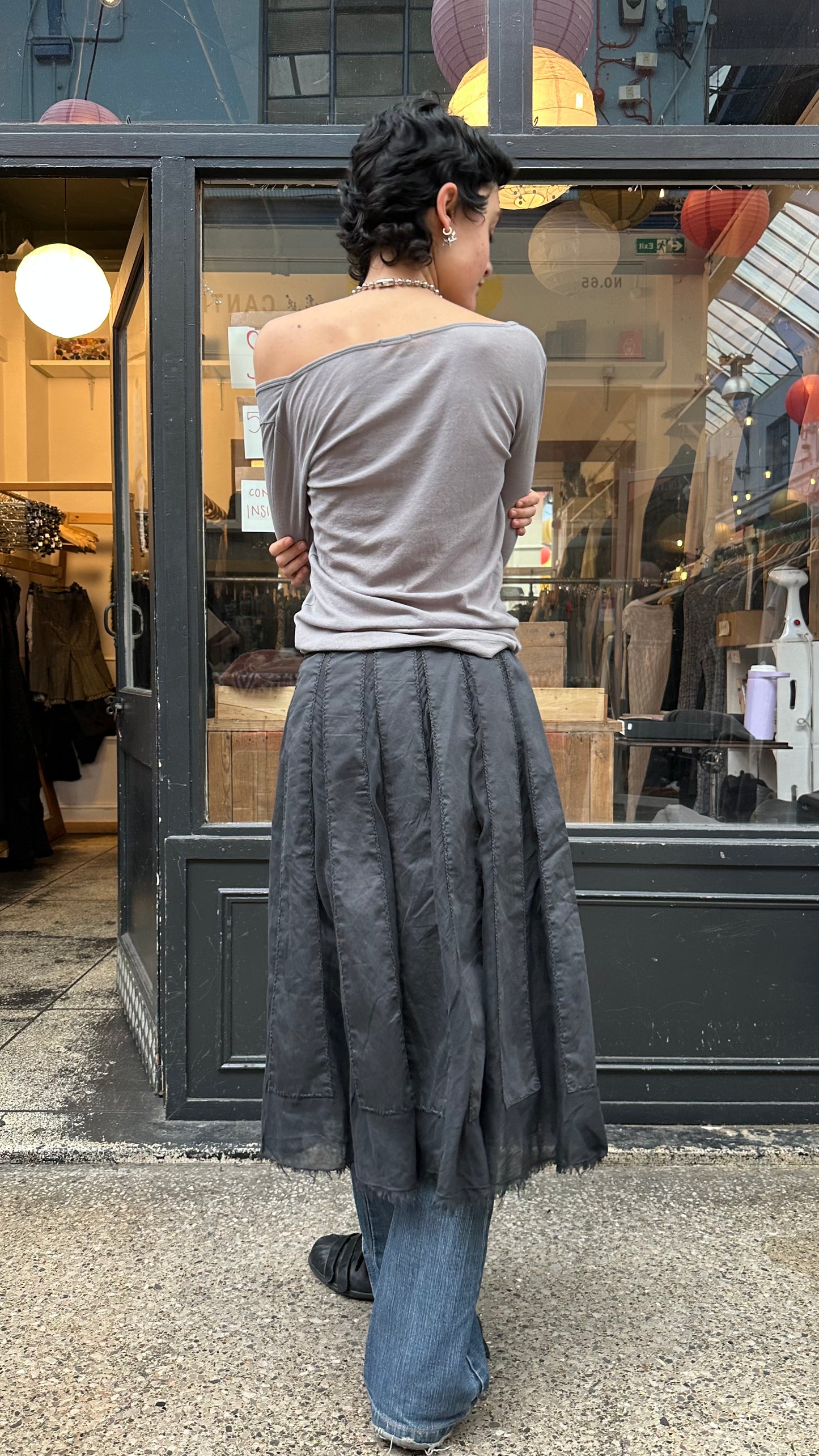 Black midi skirt with sheer panels