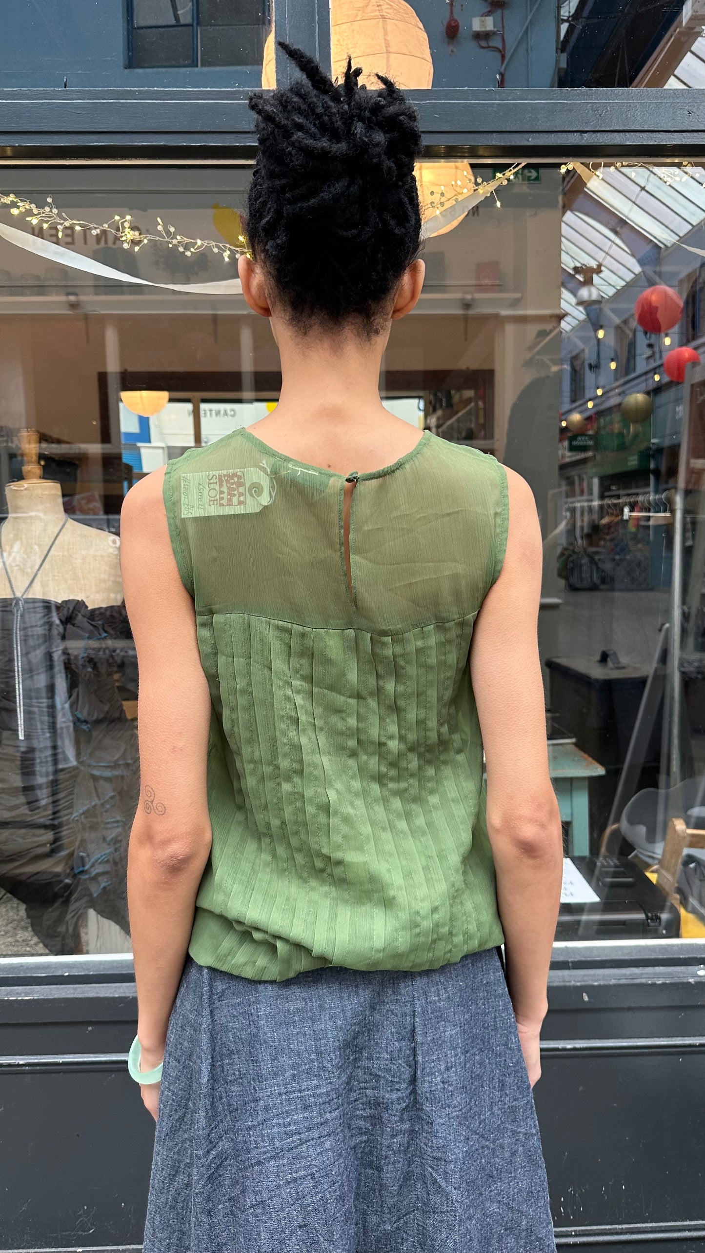 Green pleated mini dress