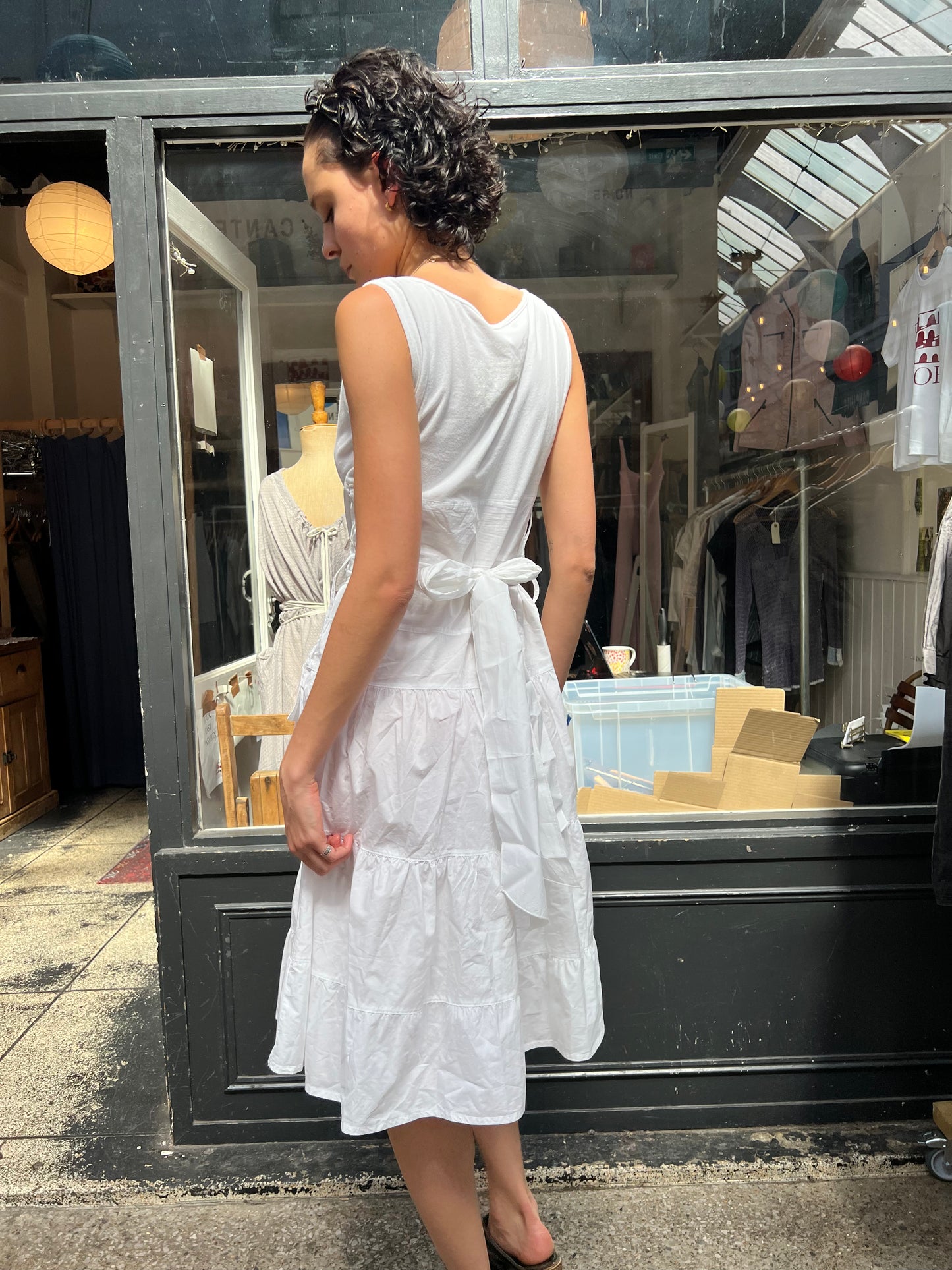 PIANURA STUDIO white tiered dress with floral applique labelled M