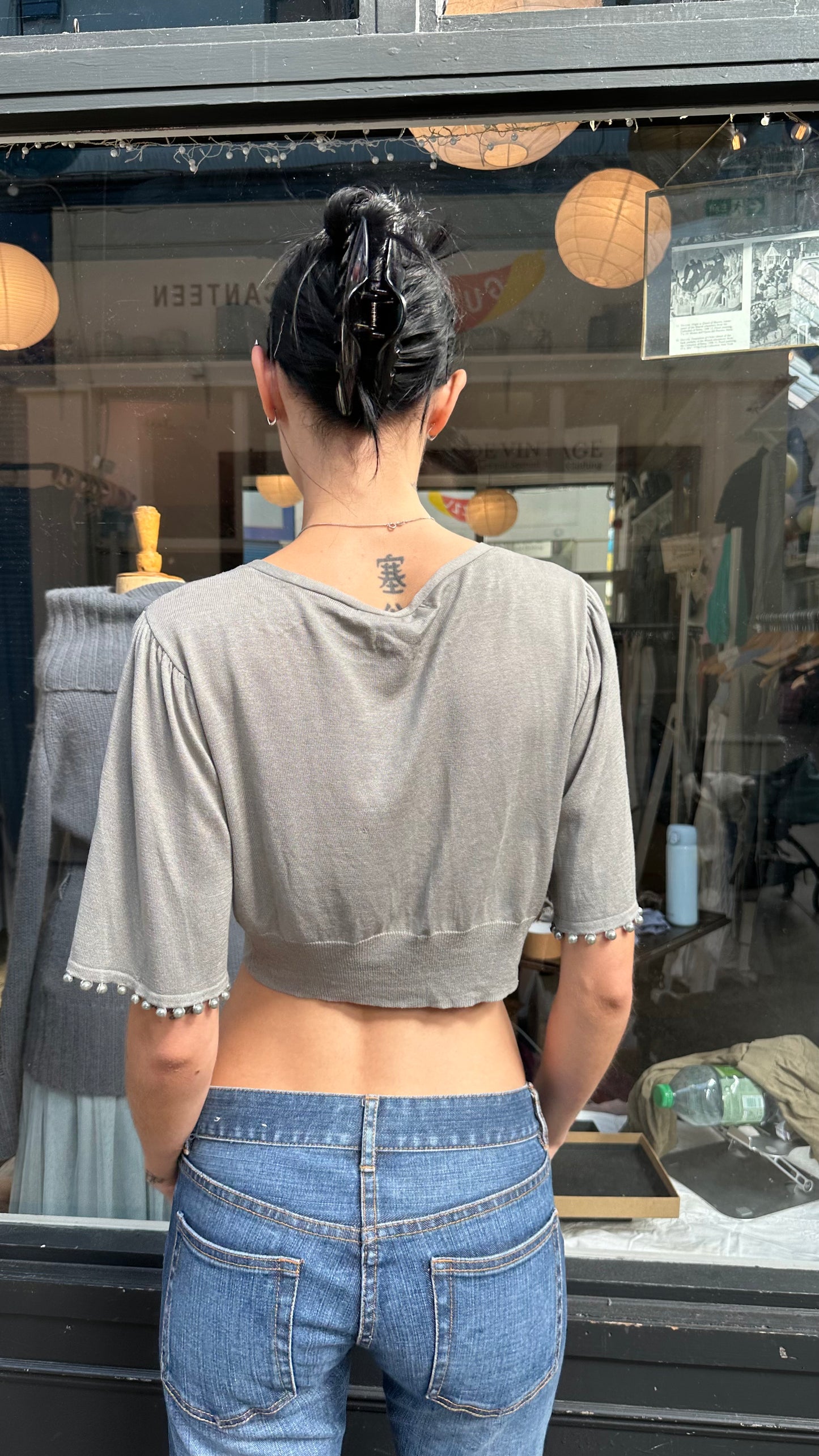 grey bolero with flowers