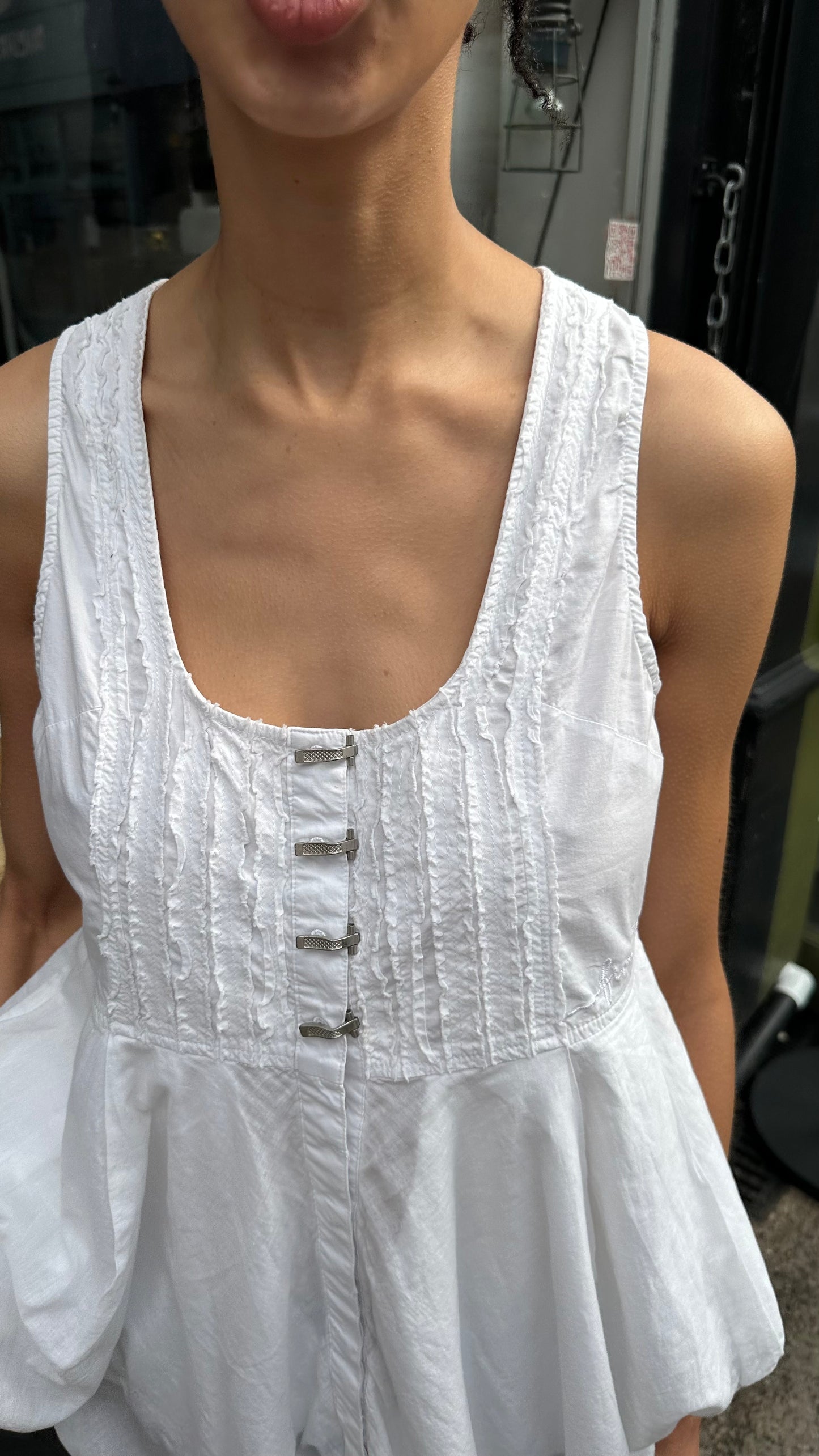 White tunic with metal hardware