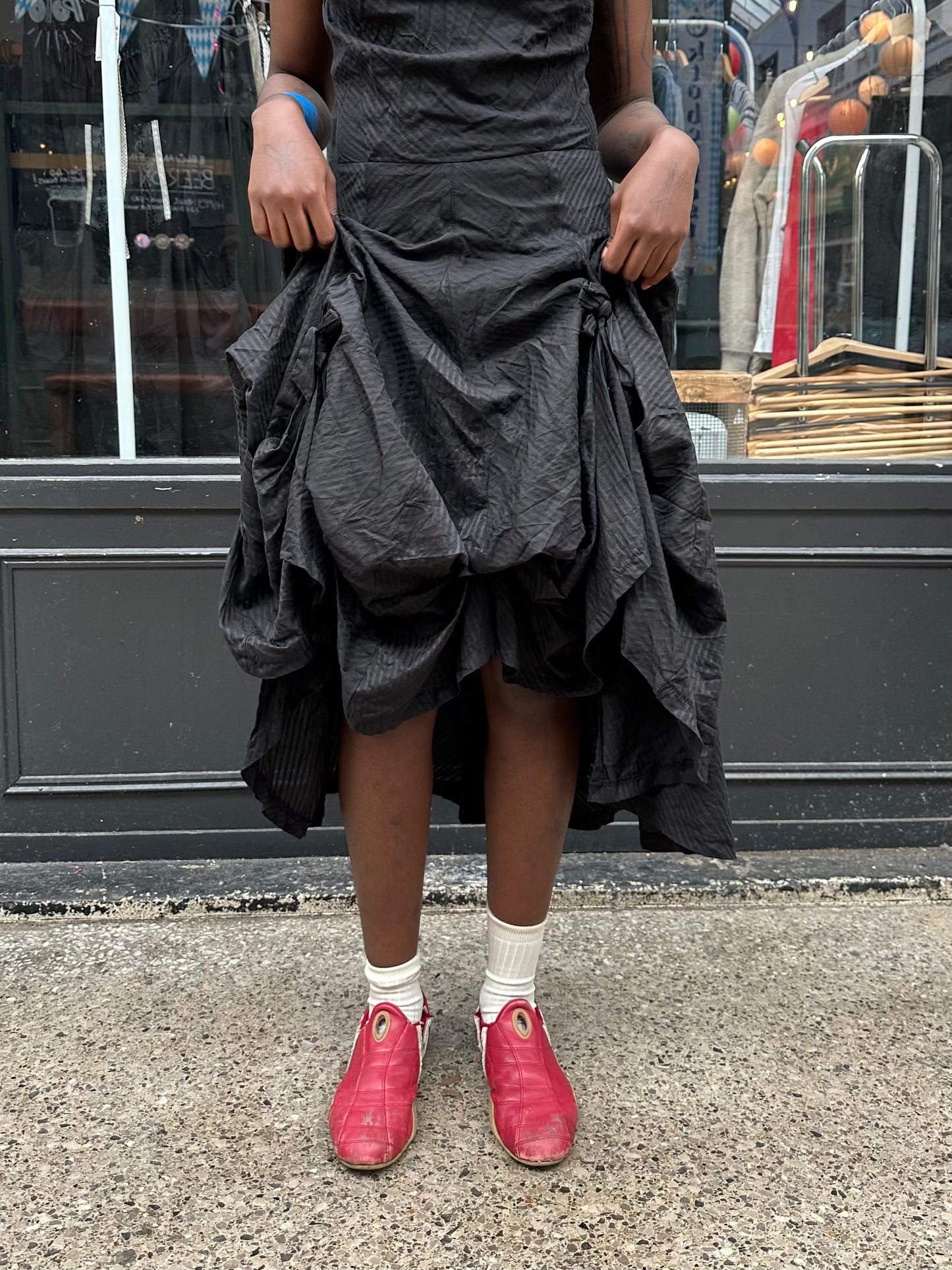 Black dress with gathered skirt