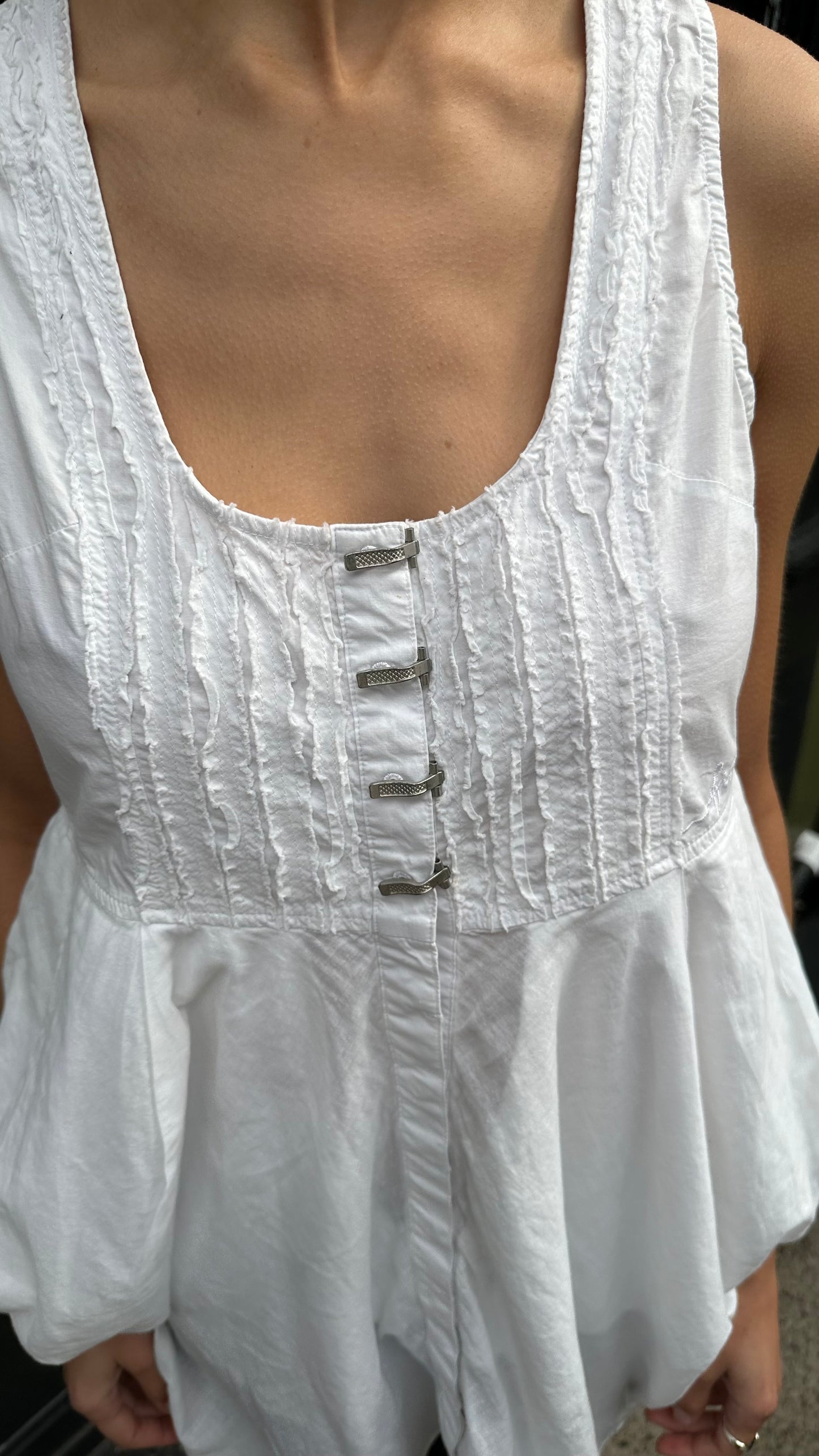 White tunic with metal hardware