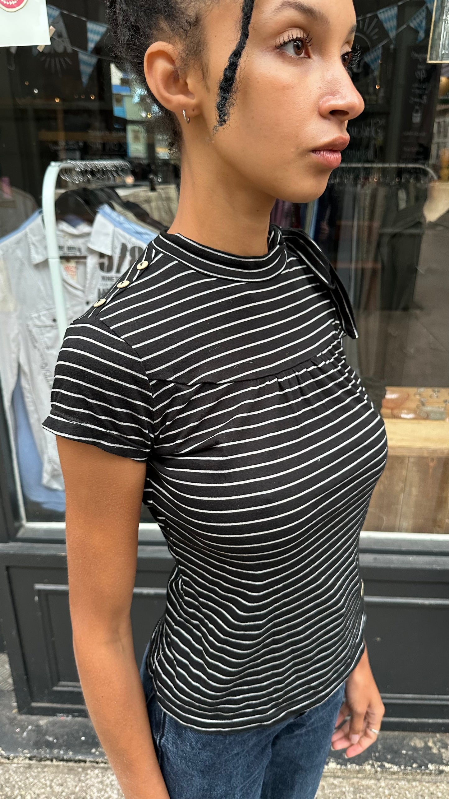 black and white striped top with high neck