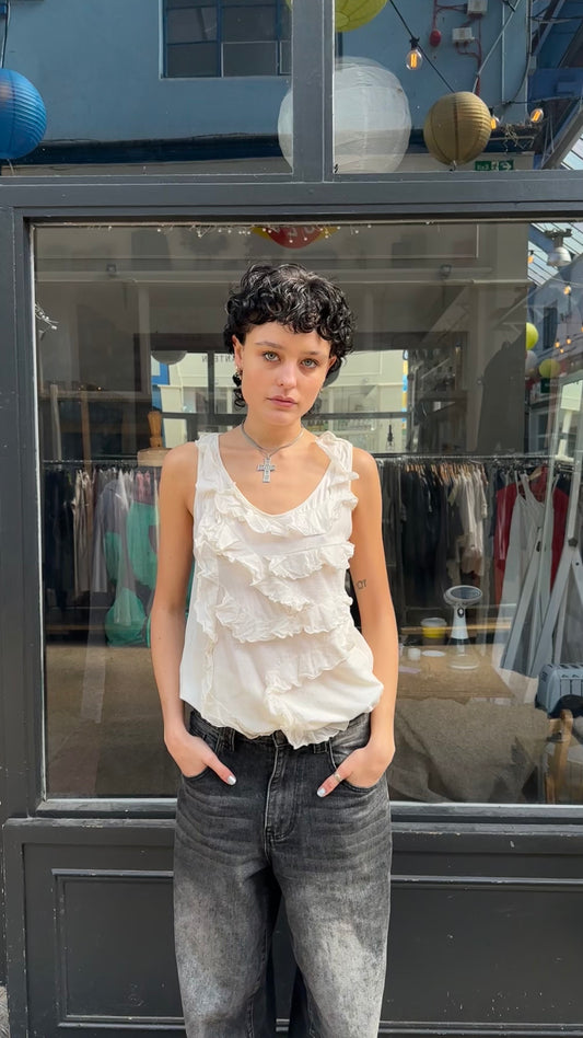 Cream ruffle sleeveless vest