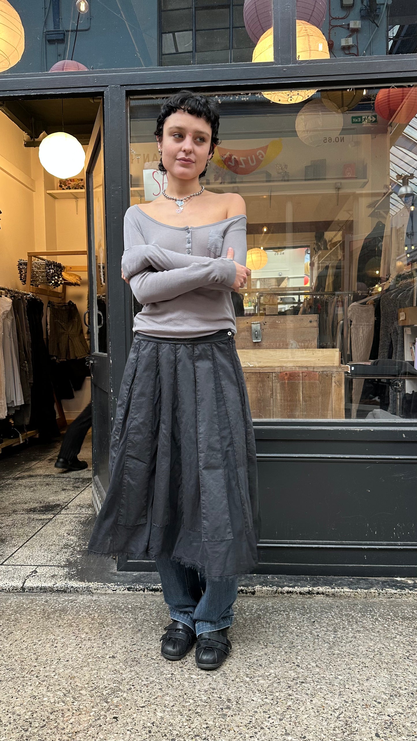 Black midi skirt with sheer panels