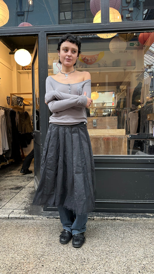 Black midi skirt with sheer panels