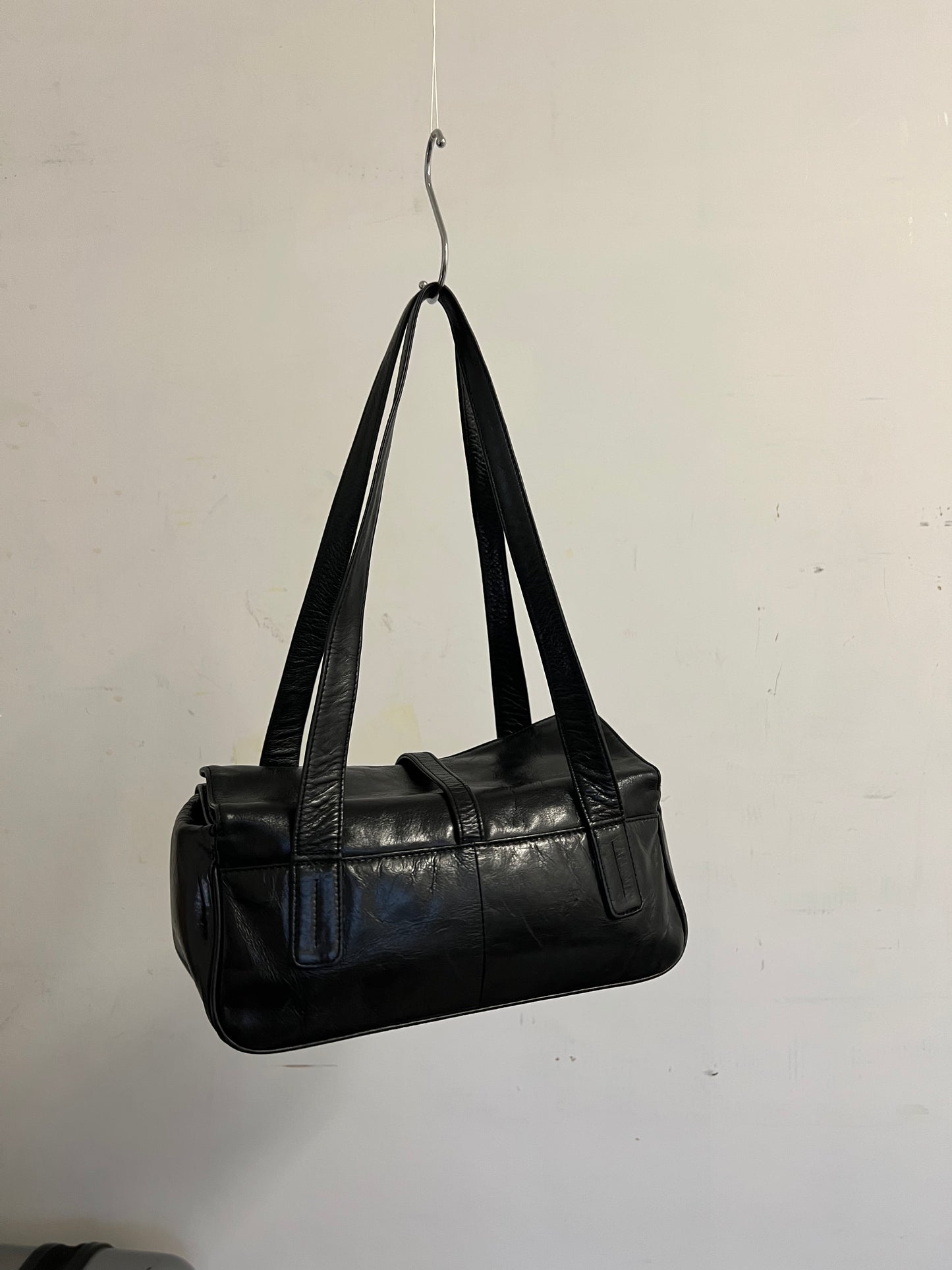 Black baguette with silver buckle