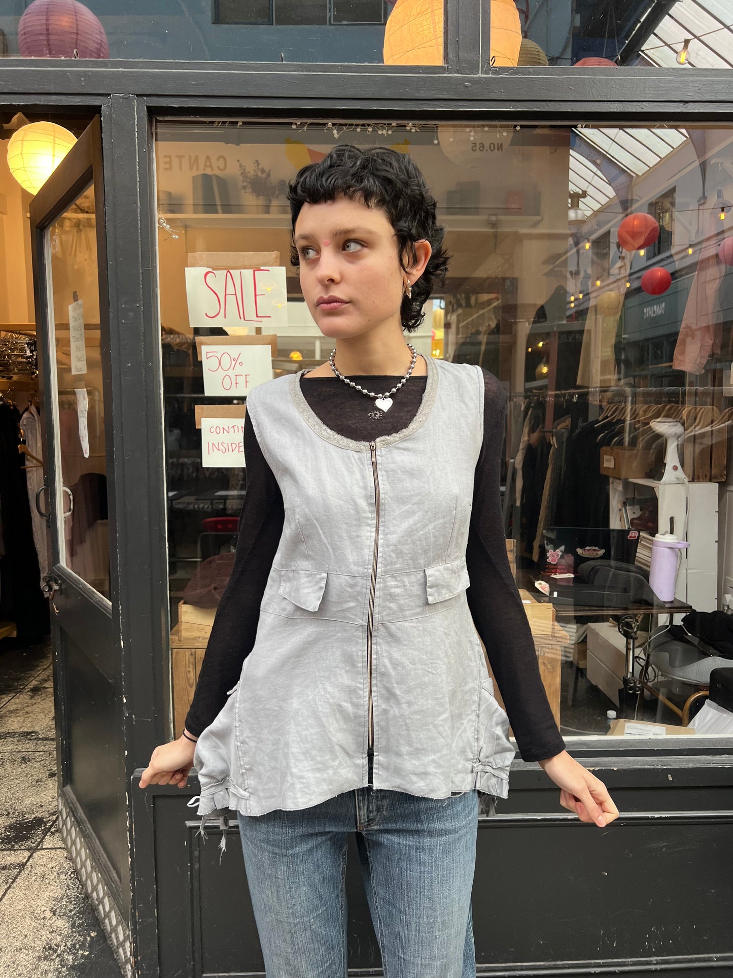 Blue grey vest with pockets
