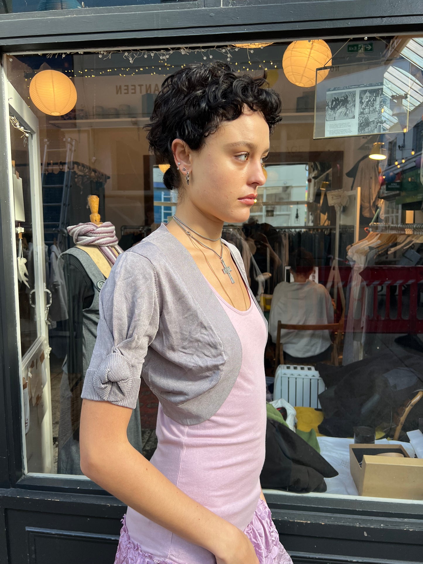 Grey bolero with roses on the sleeves