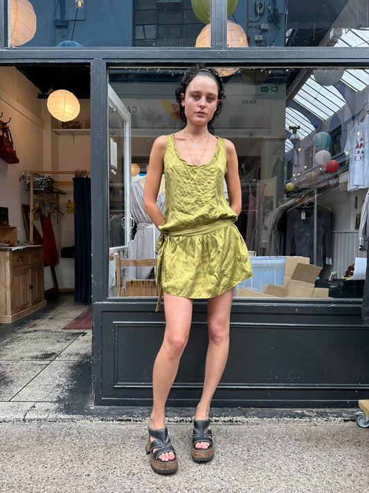 Green silk drop waist dress
