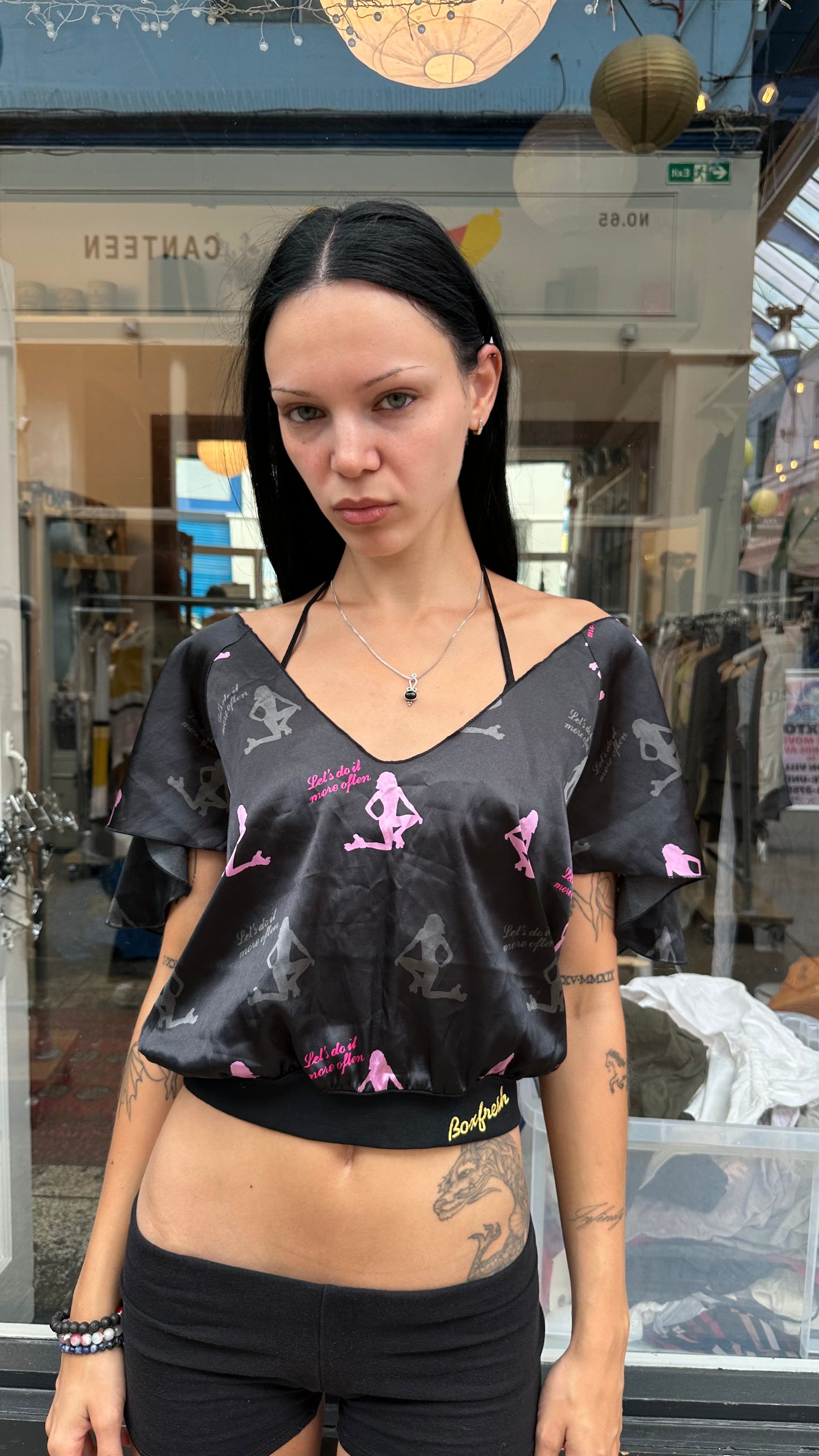 Black backless top with chain