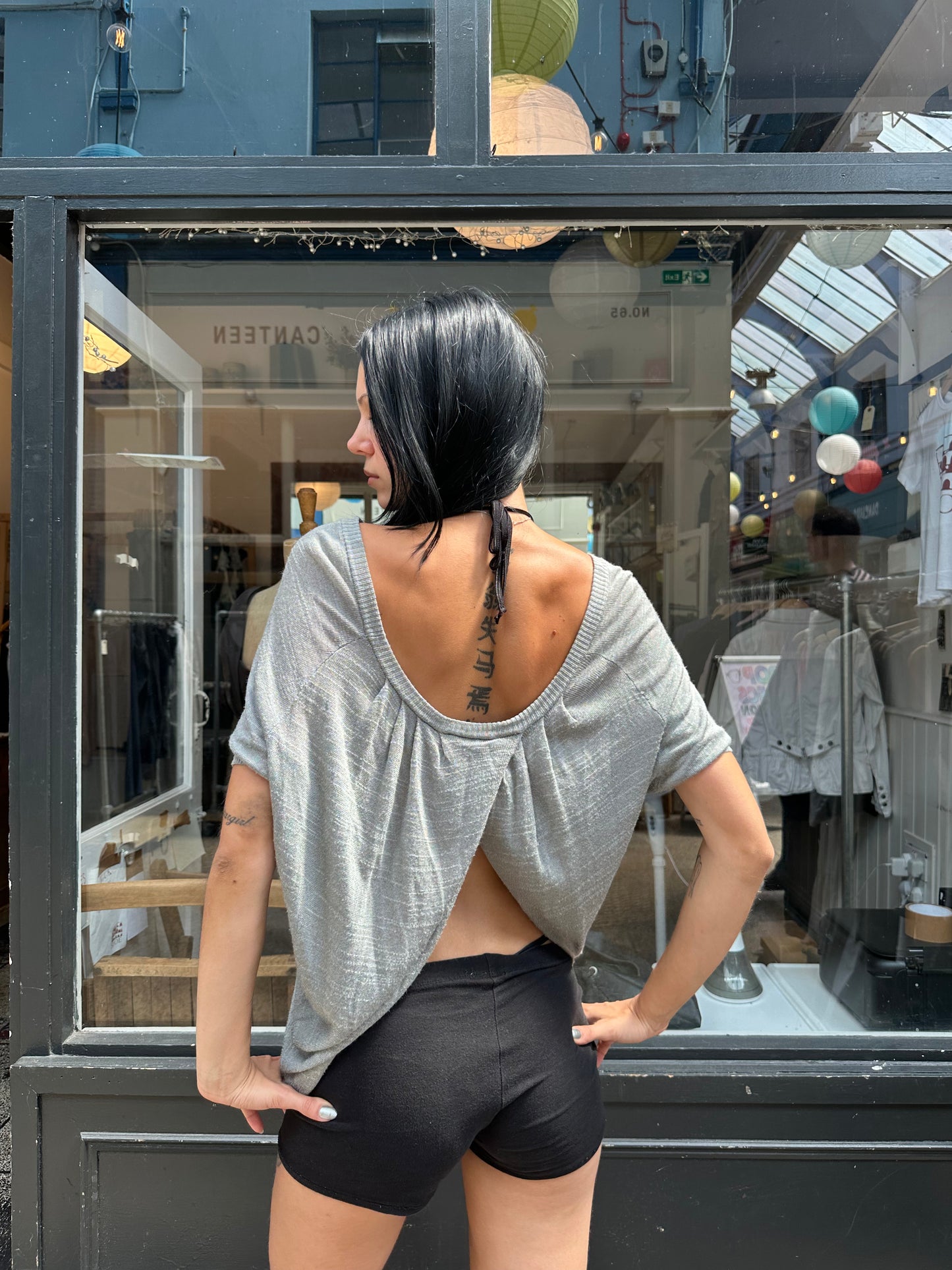 Sage green open back top