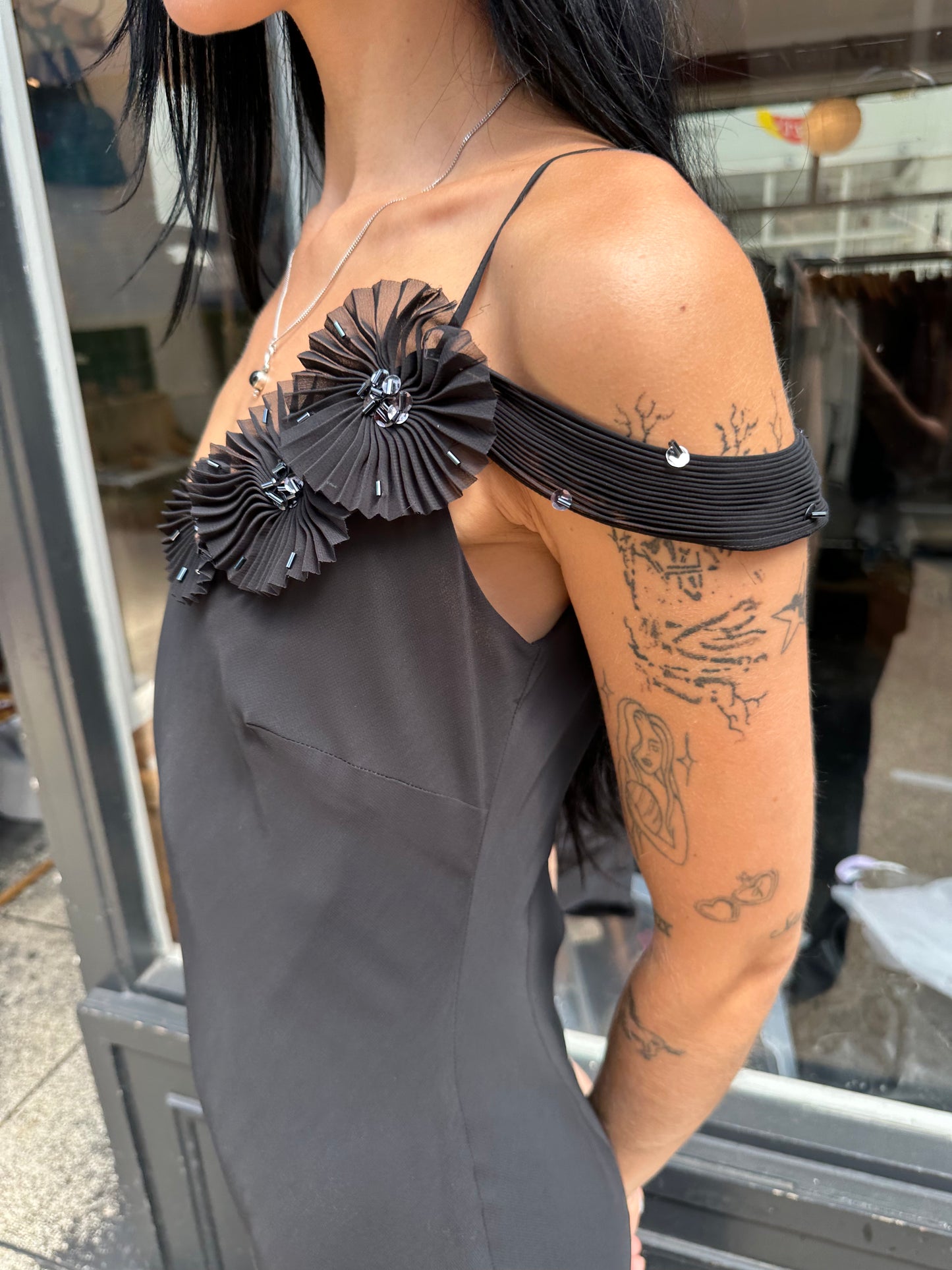 Black maxi dress with rosettes
