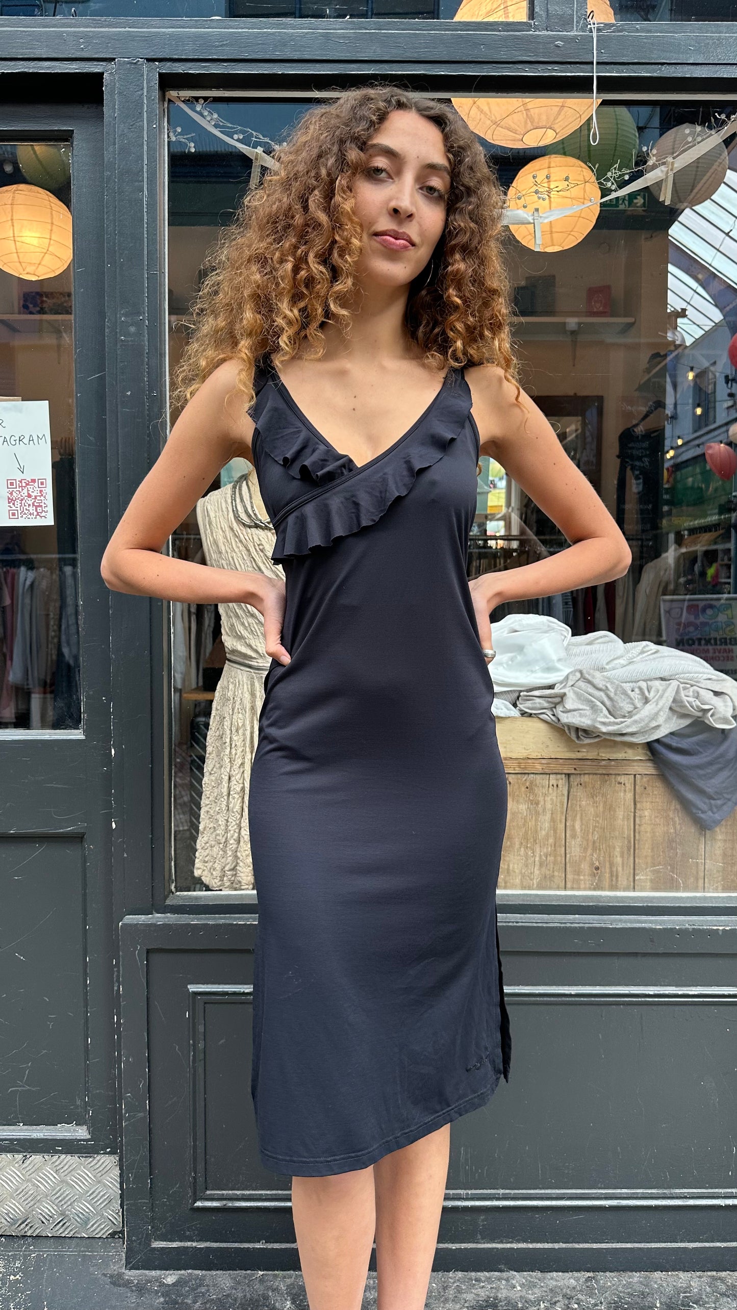 Black midi dress with ruffles