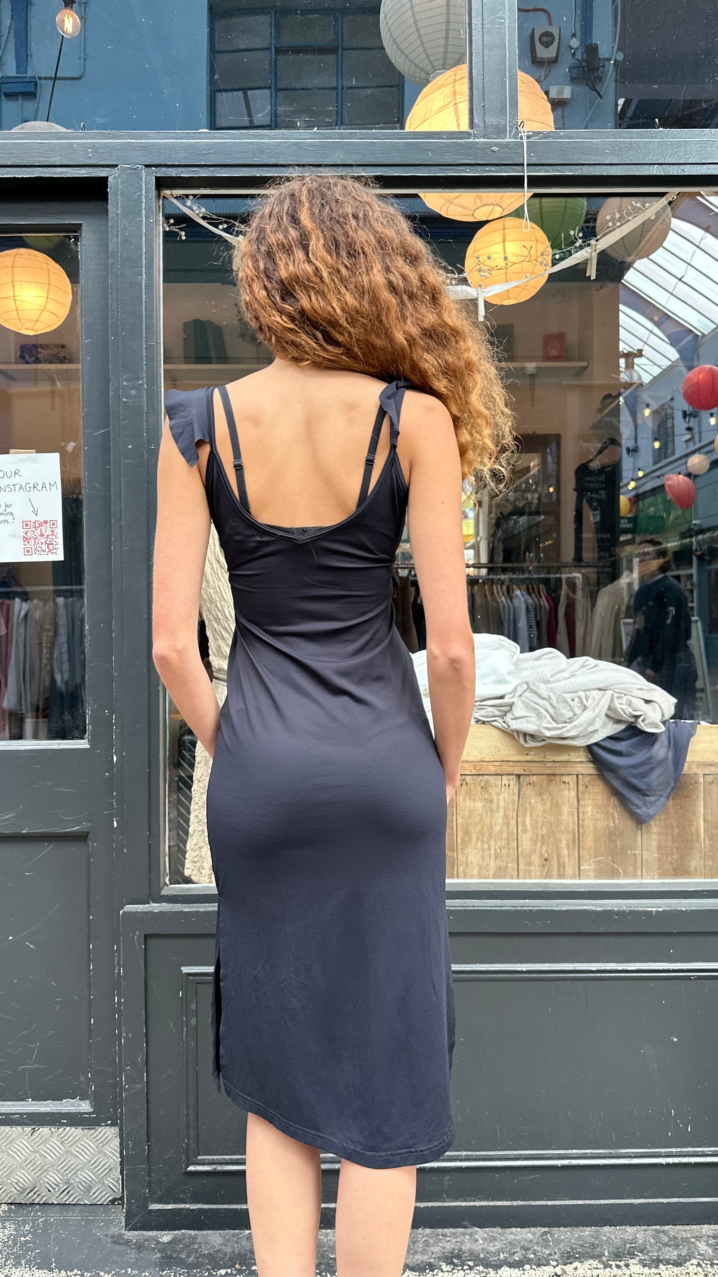 Black midi dress with ruffles