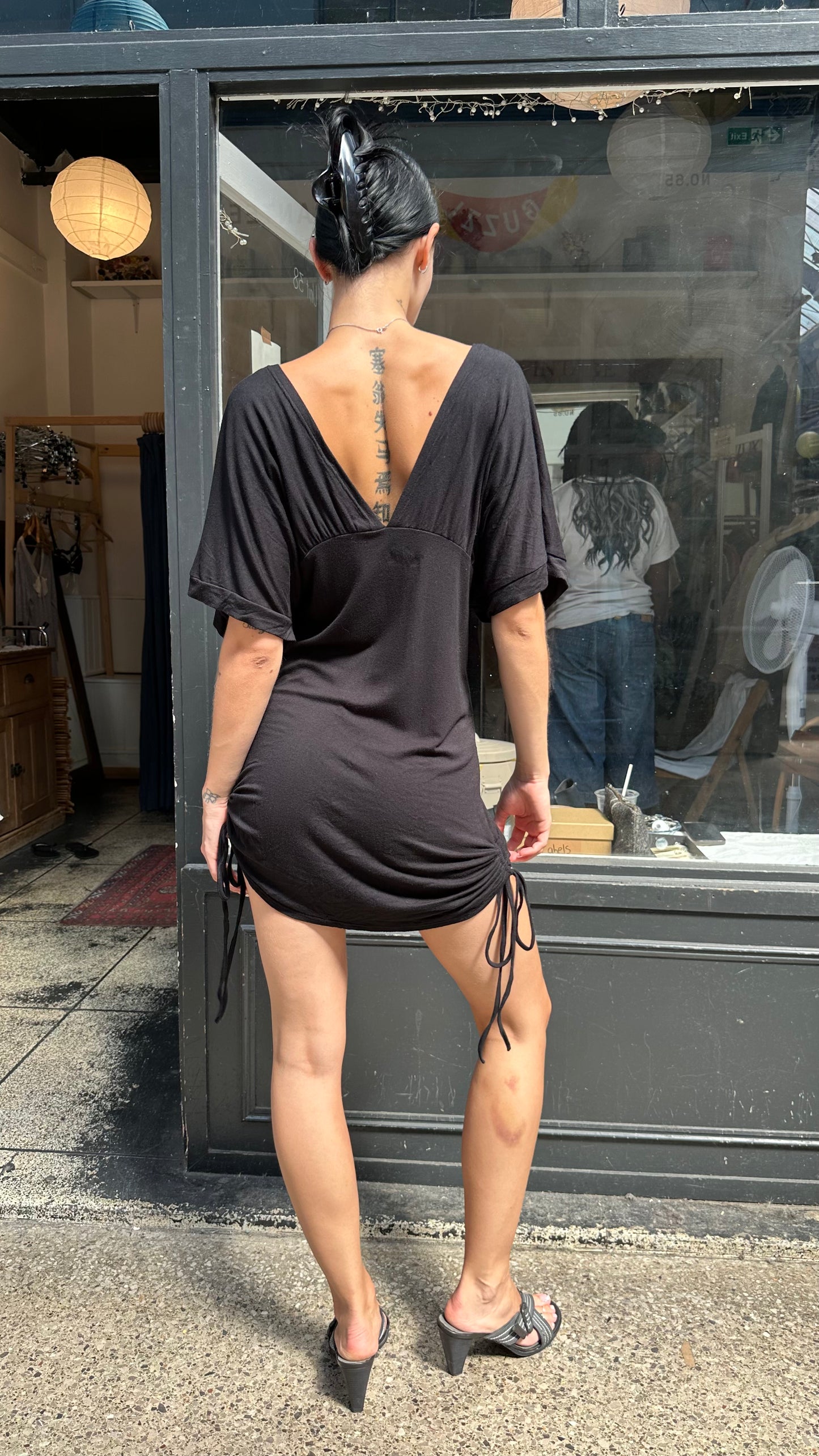 black batwing mini dress