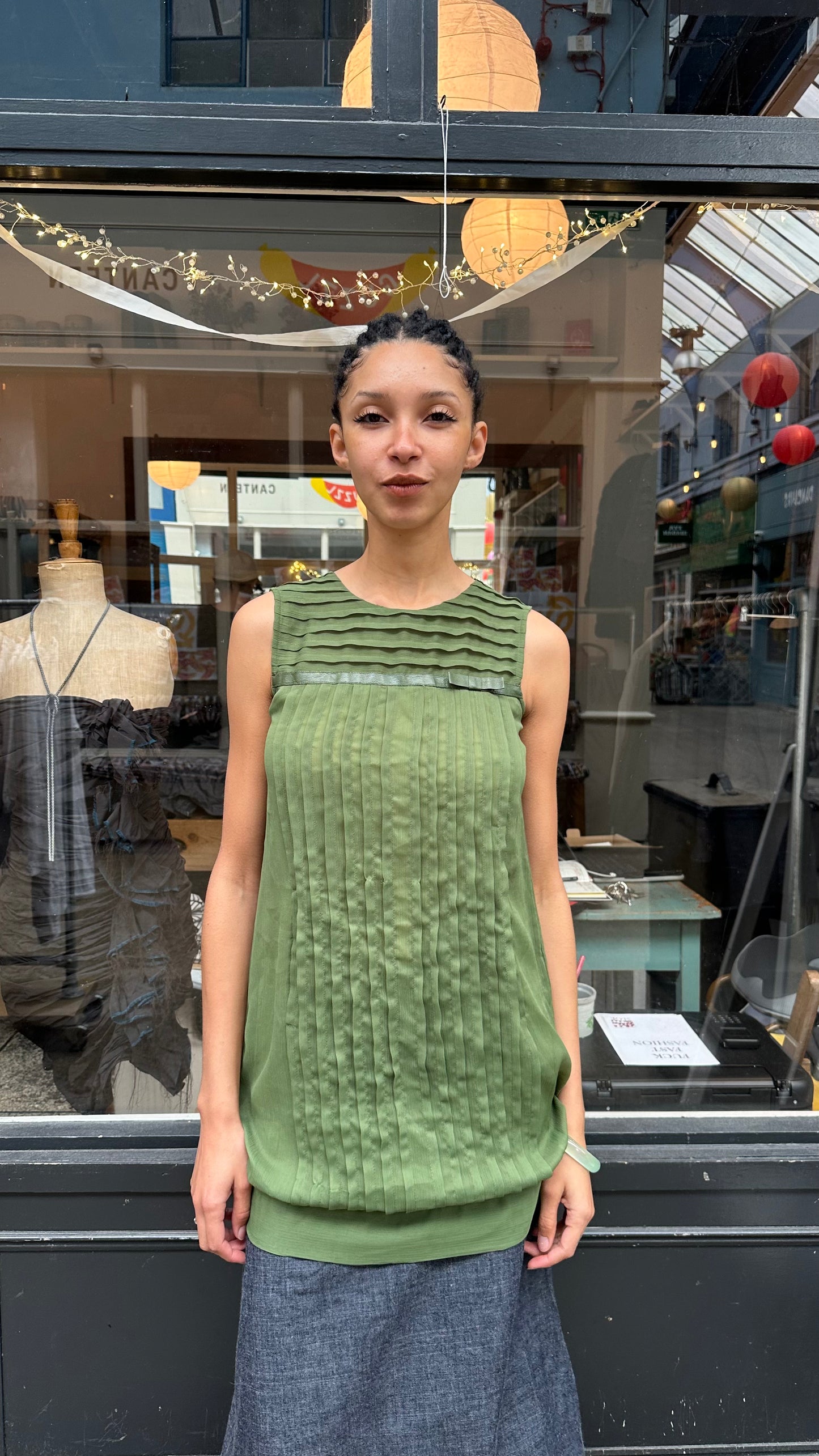 Green pleated mini dress