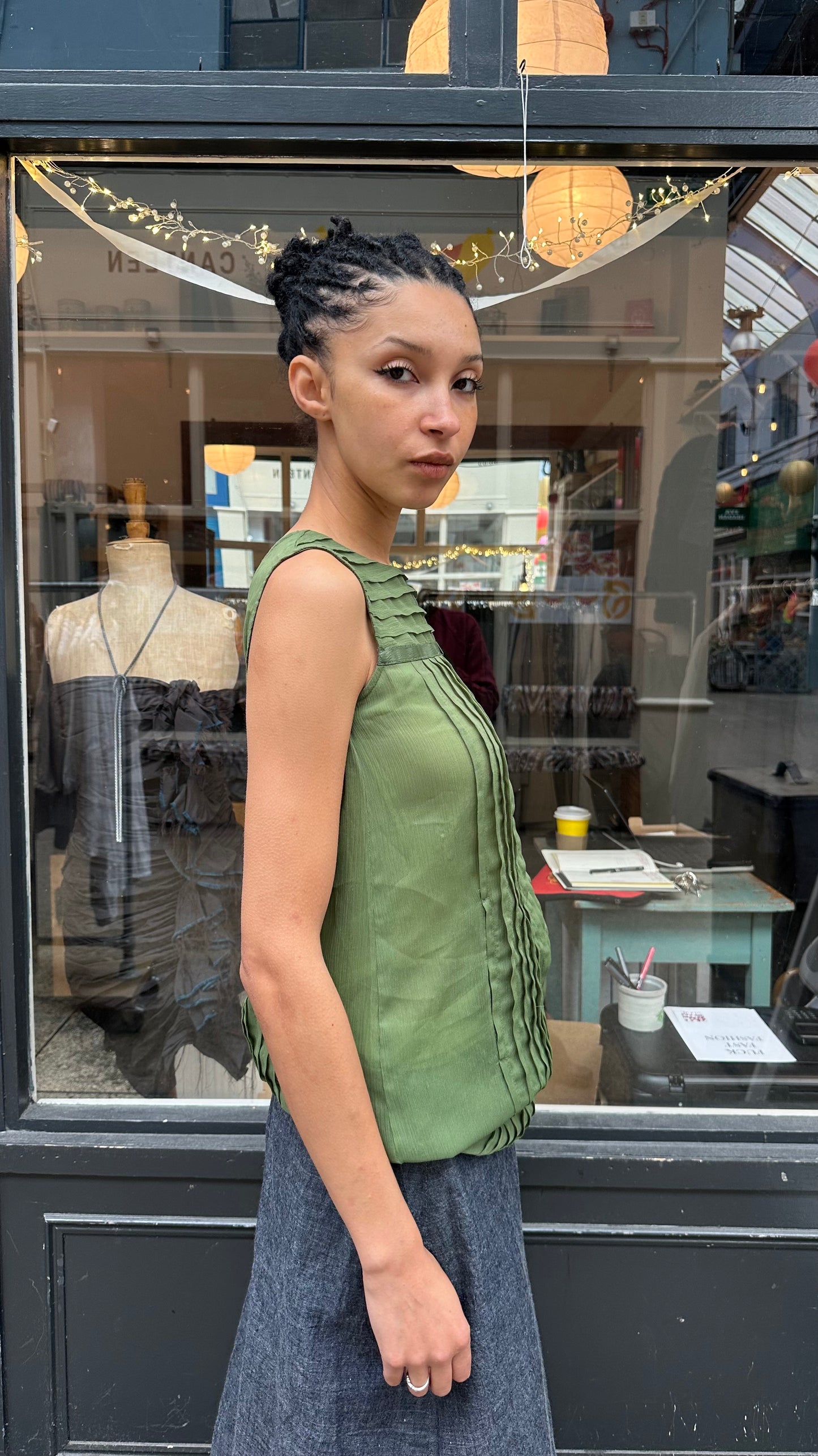 Green pleated mini dress