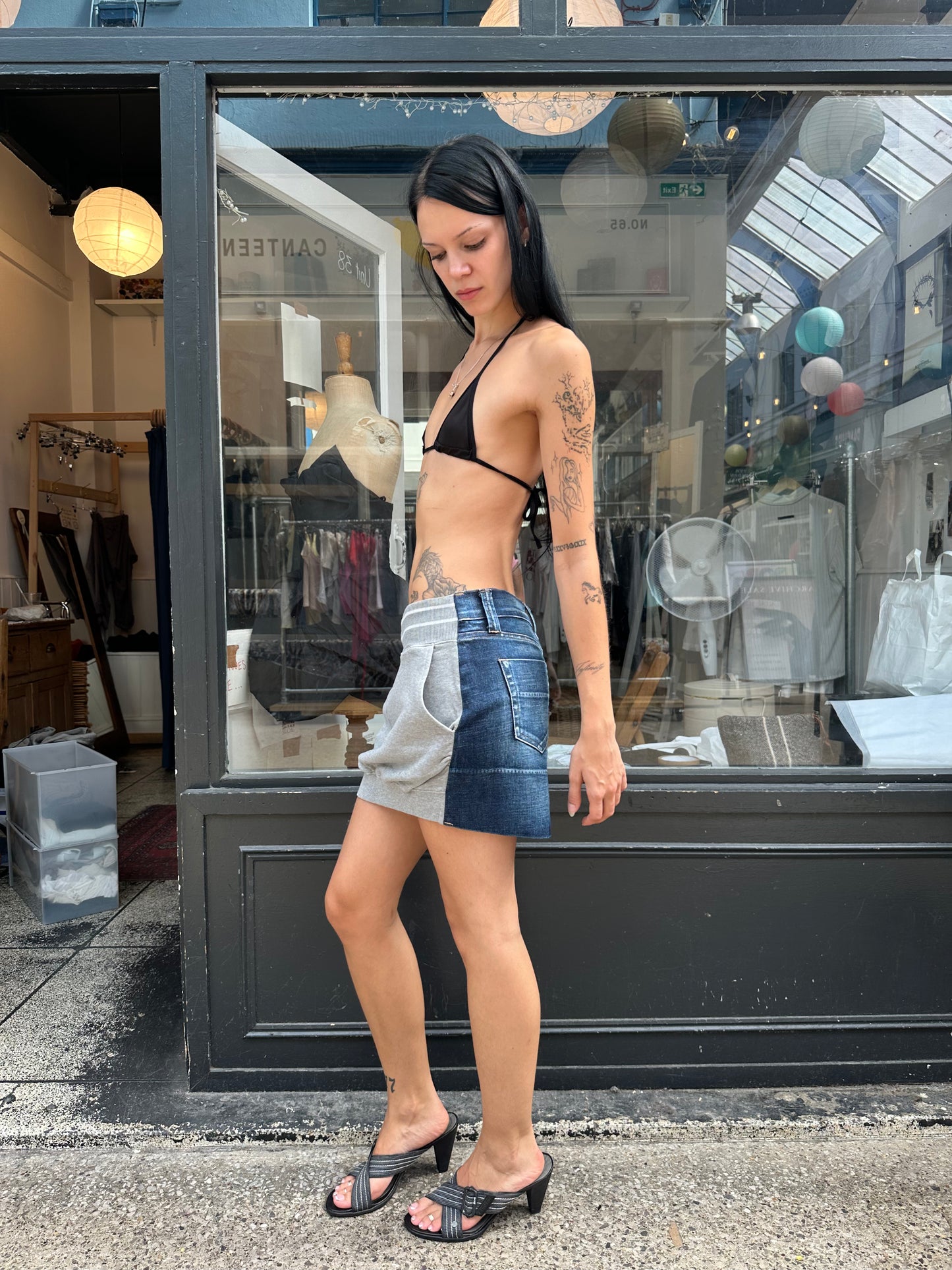 Tracksuit and denim miniskirt