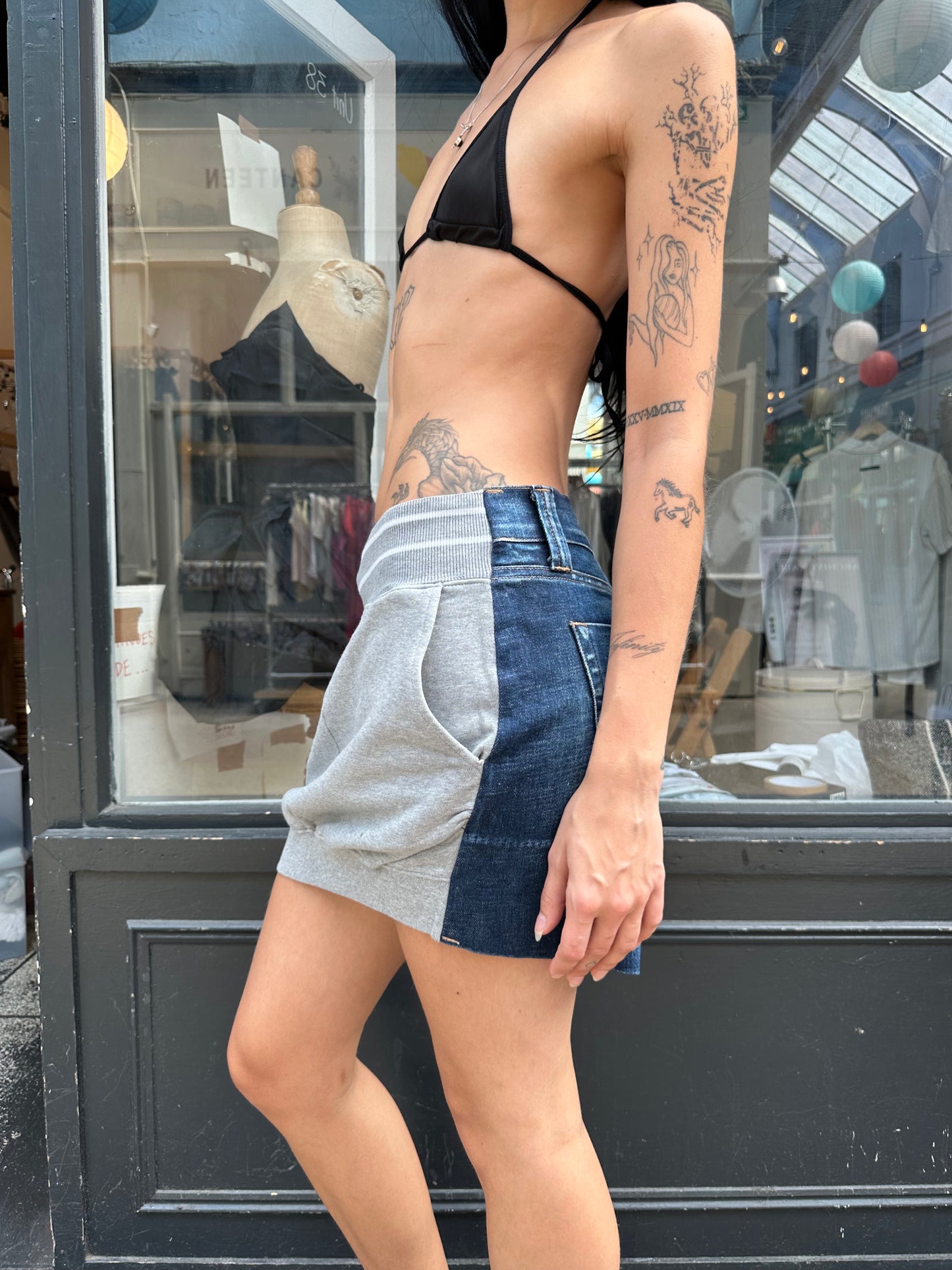 Tracksuit and denim miniskirt