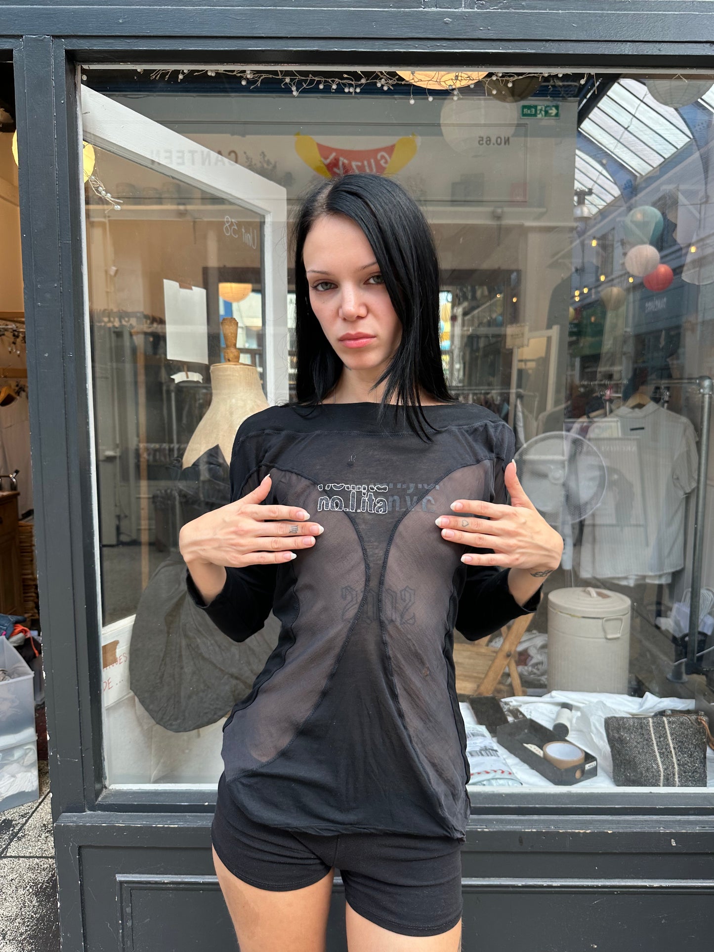 Nolita sheer black top