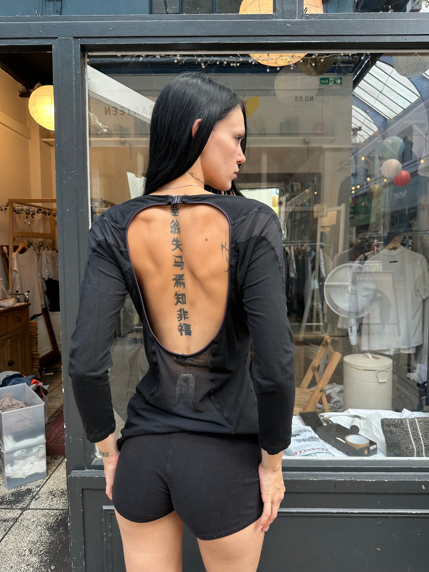 Nolita sheer black top