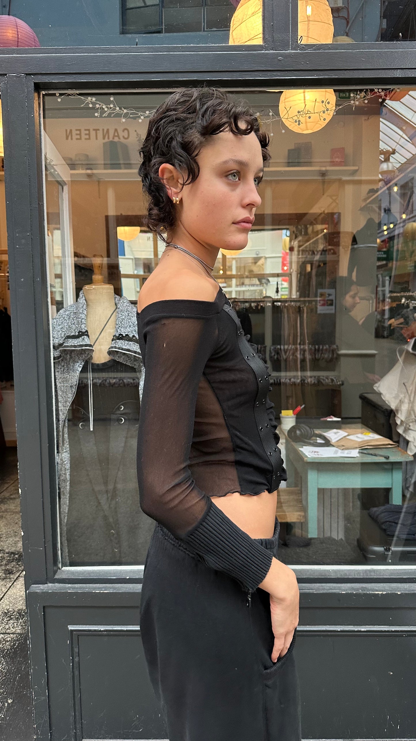 Long sleeve top with grommet strip