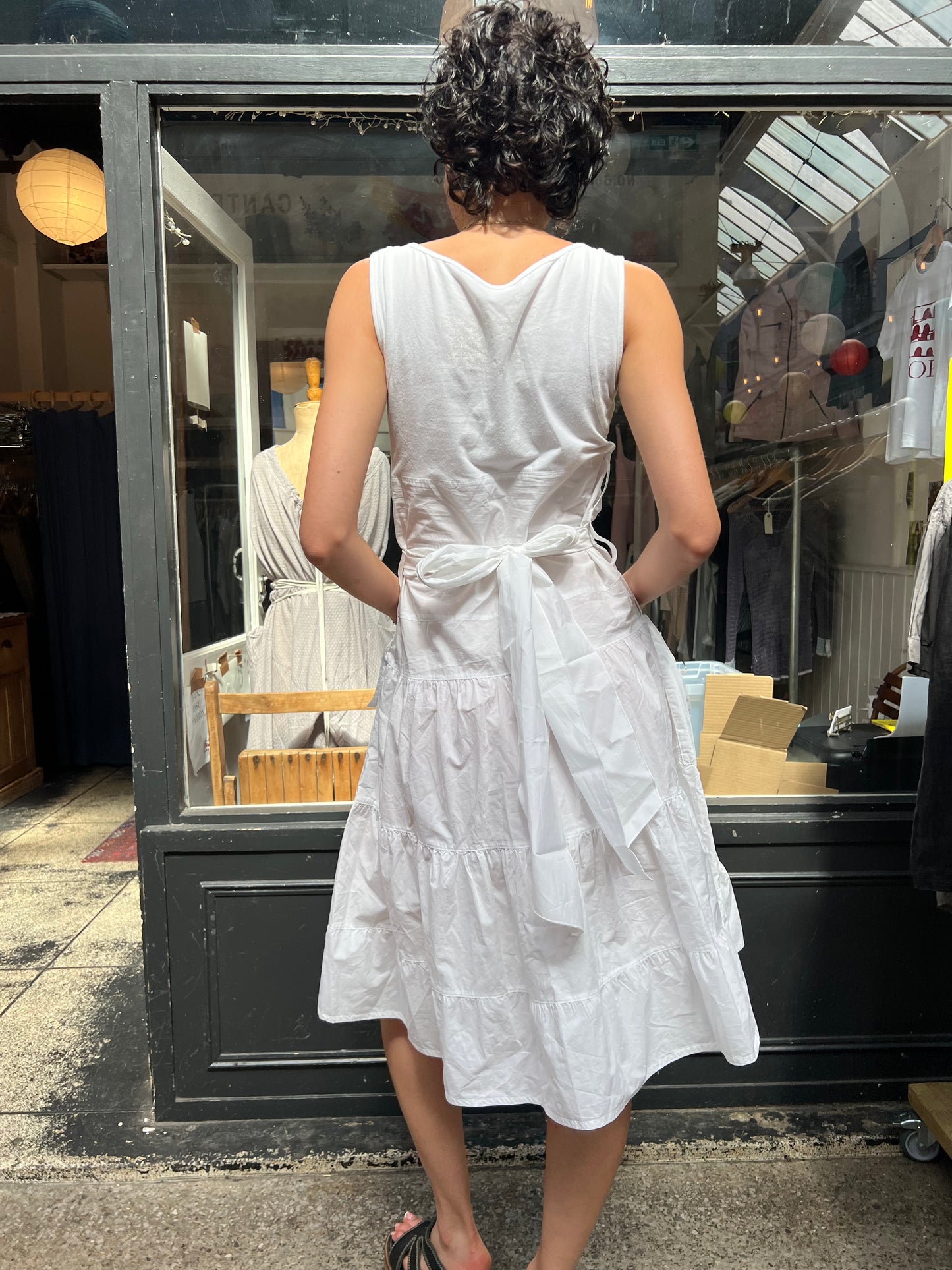 PIANURA STUDIO white tiered dress with floral applique labelled M