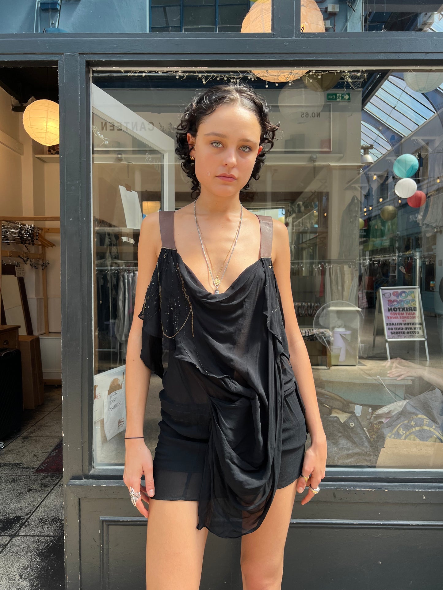 Black sheer dress with leather straps