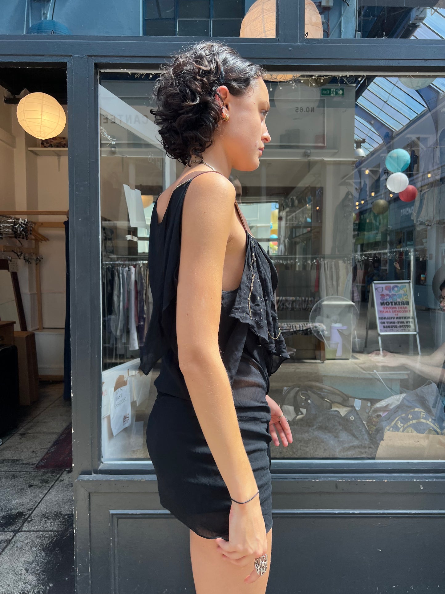 Black sheer dress with leather straps