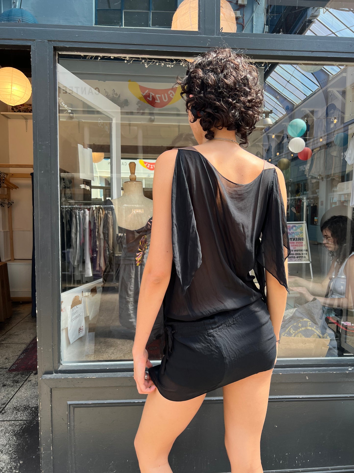 Black sheer dress with leather straps