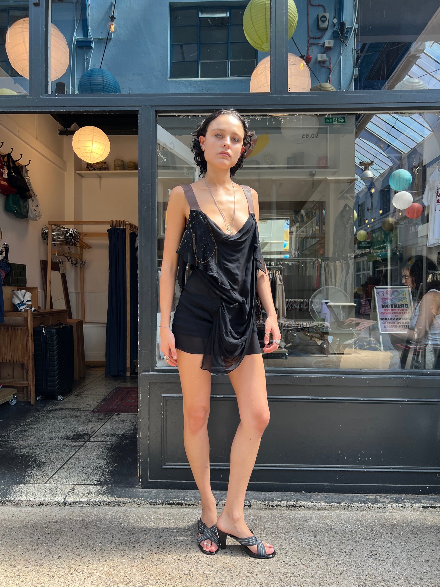 Black sheer dress with leather straps