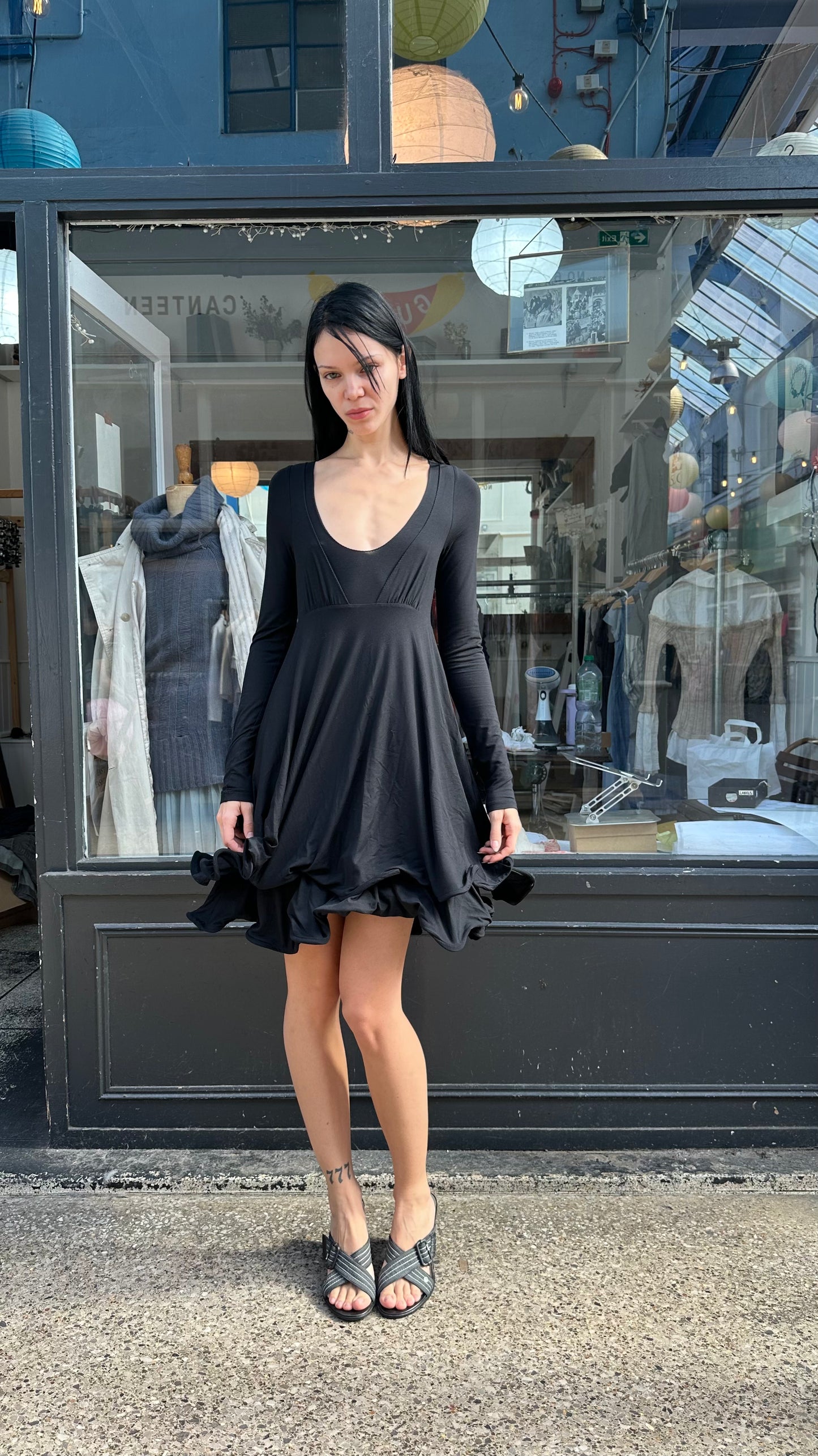 Black midi dress with wired hem