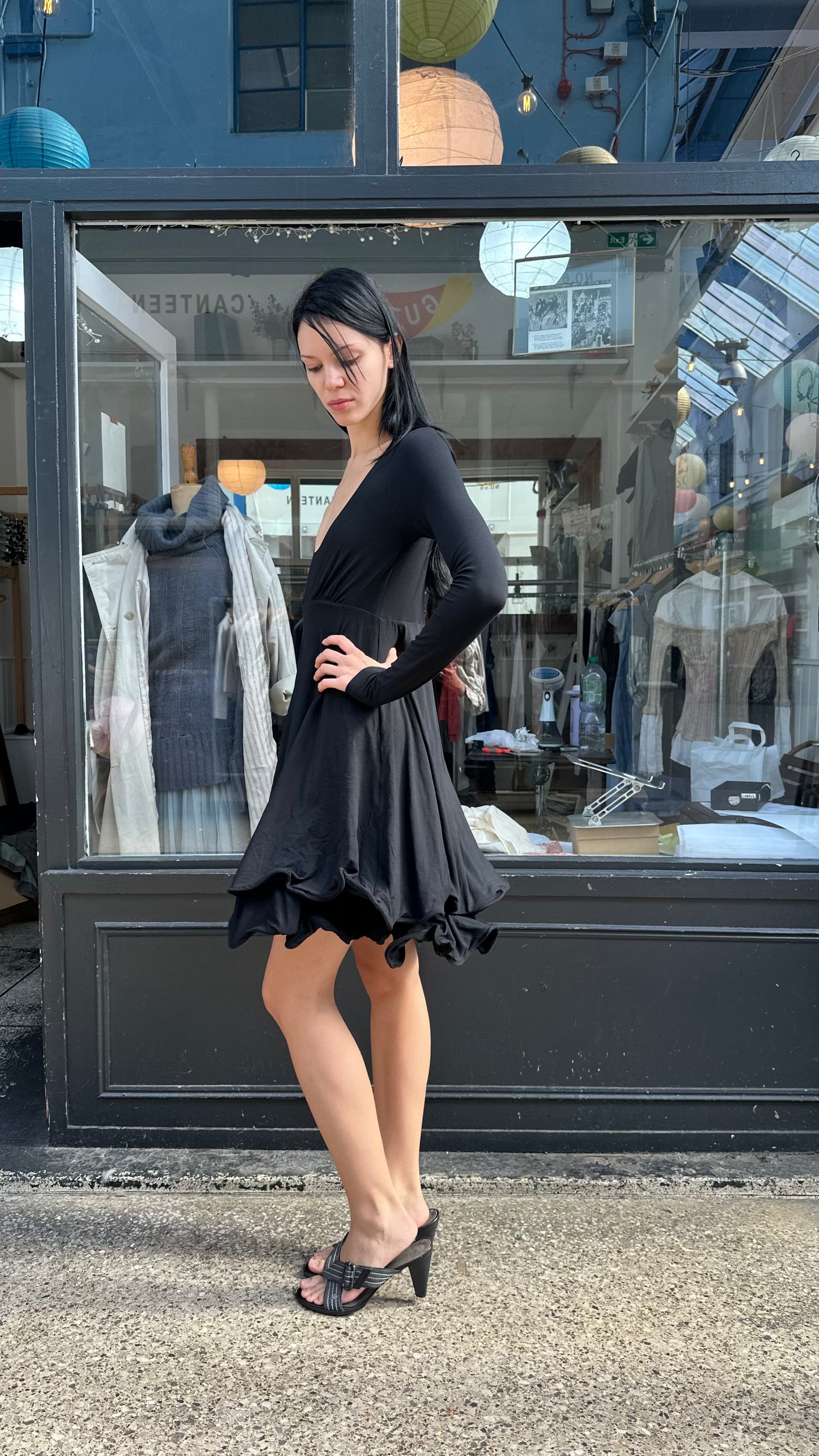 Black midi dress with wired hem