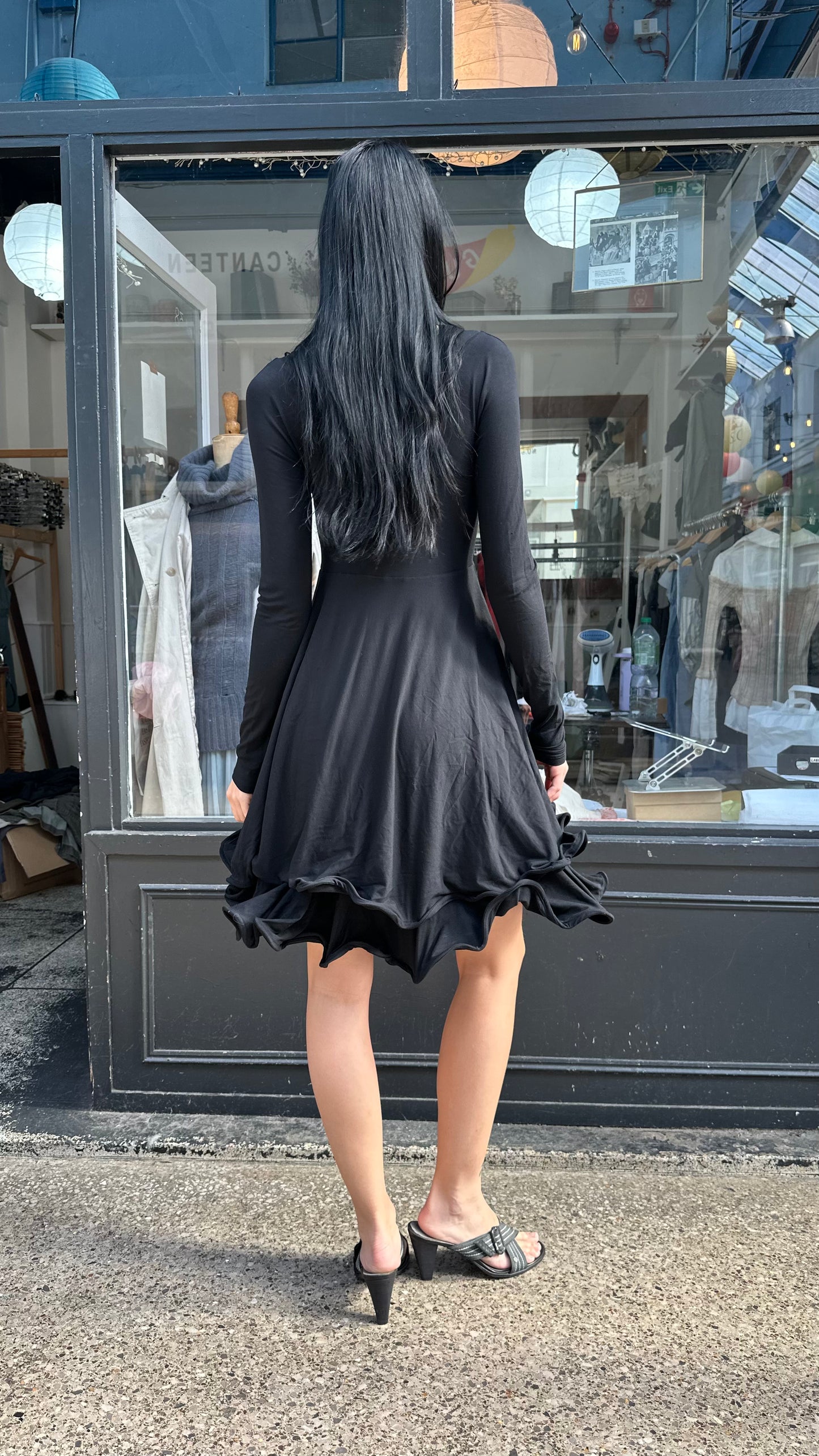 Black midi dress with wired hem