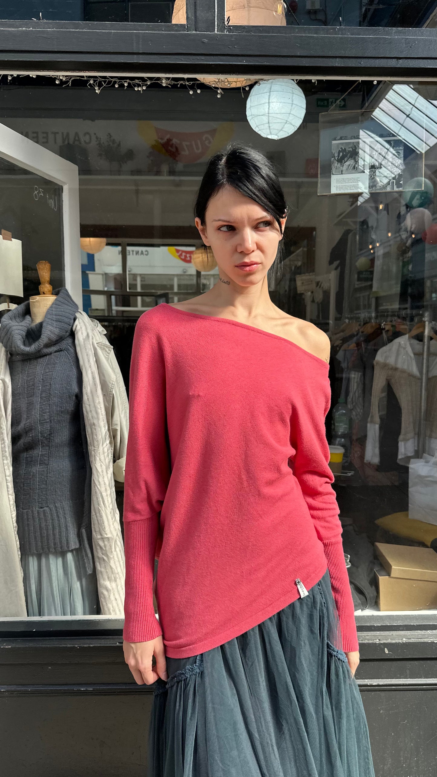 Coral asymmetric knit top