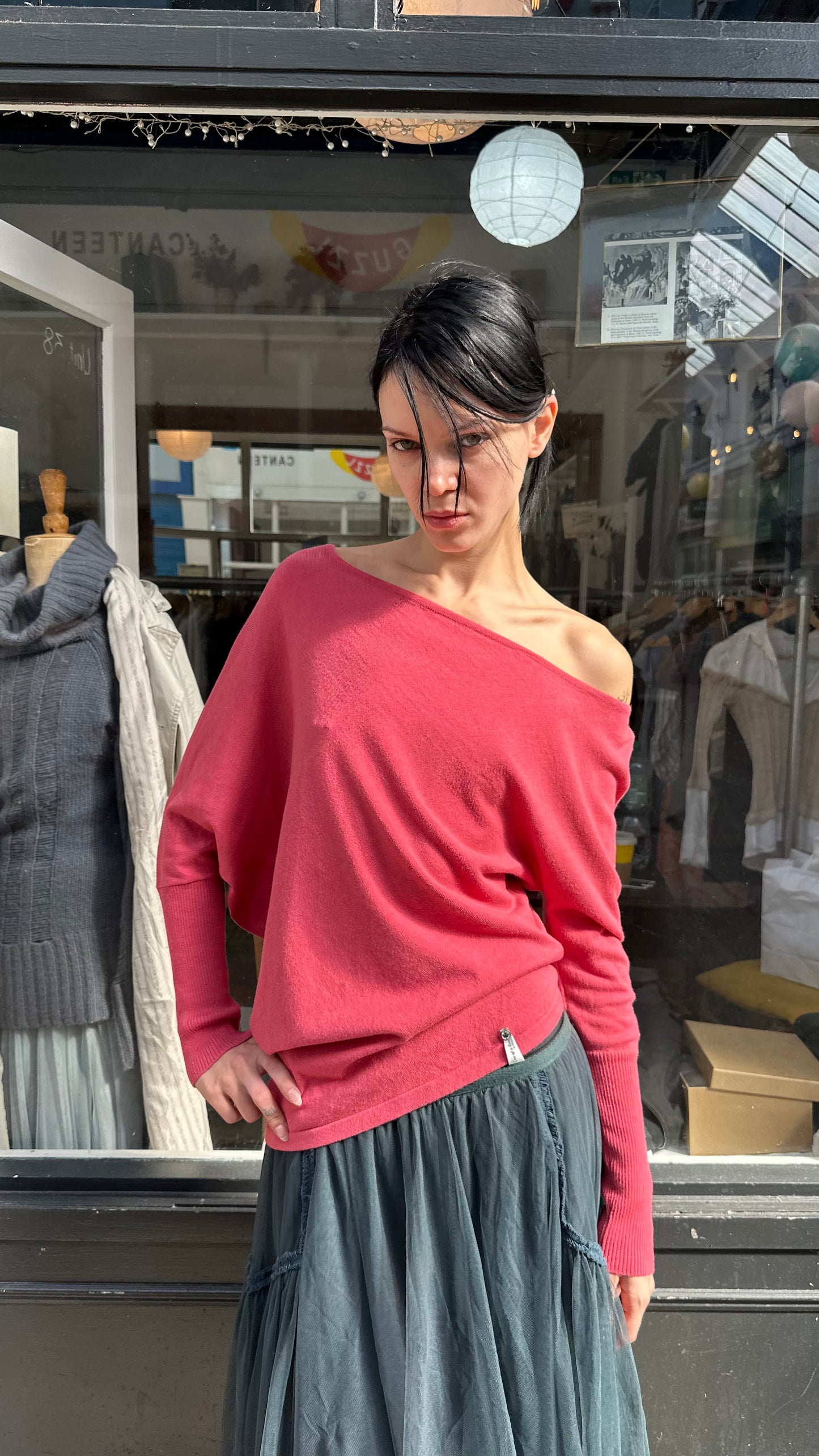Coral asymmetric knit top