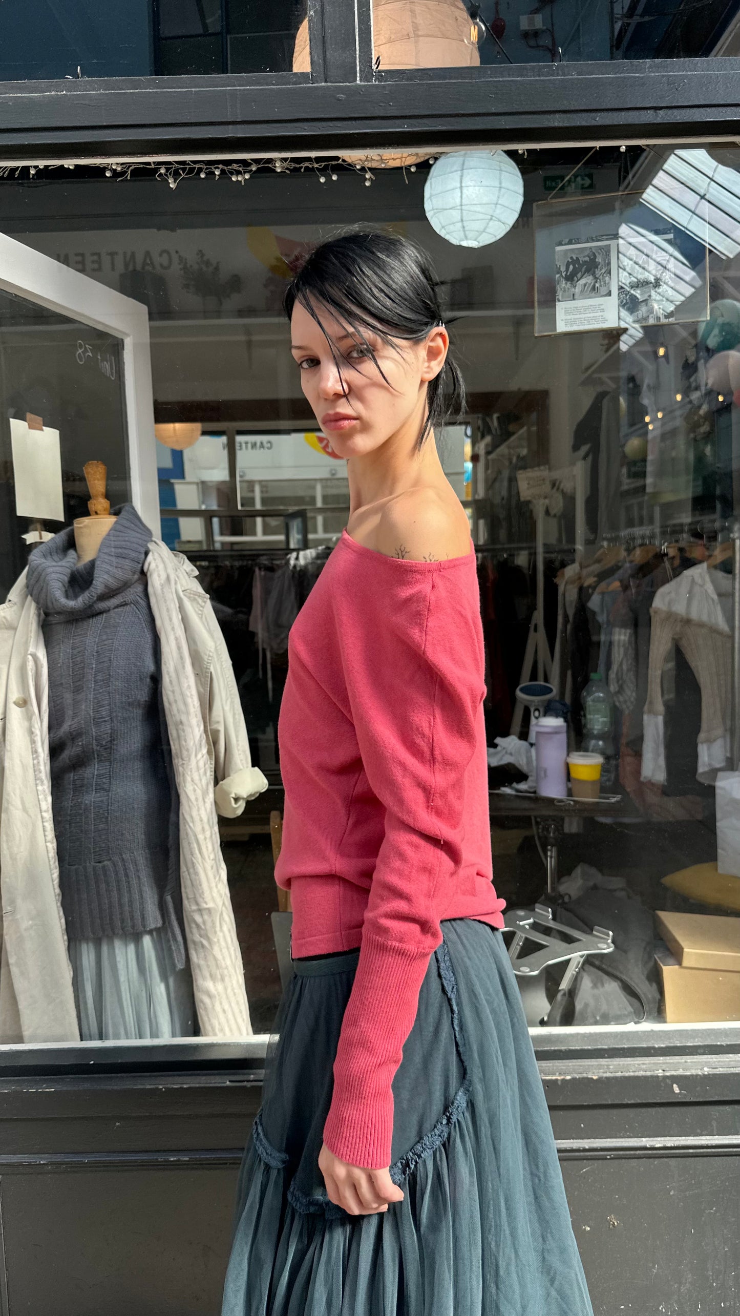 Coral asymmetric knit top