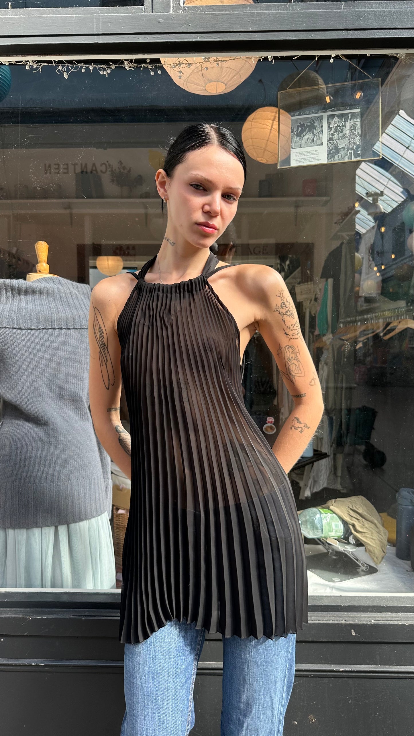 Black pleated sheer halter top with open back