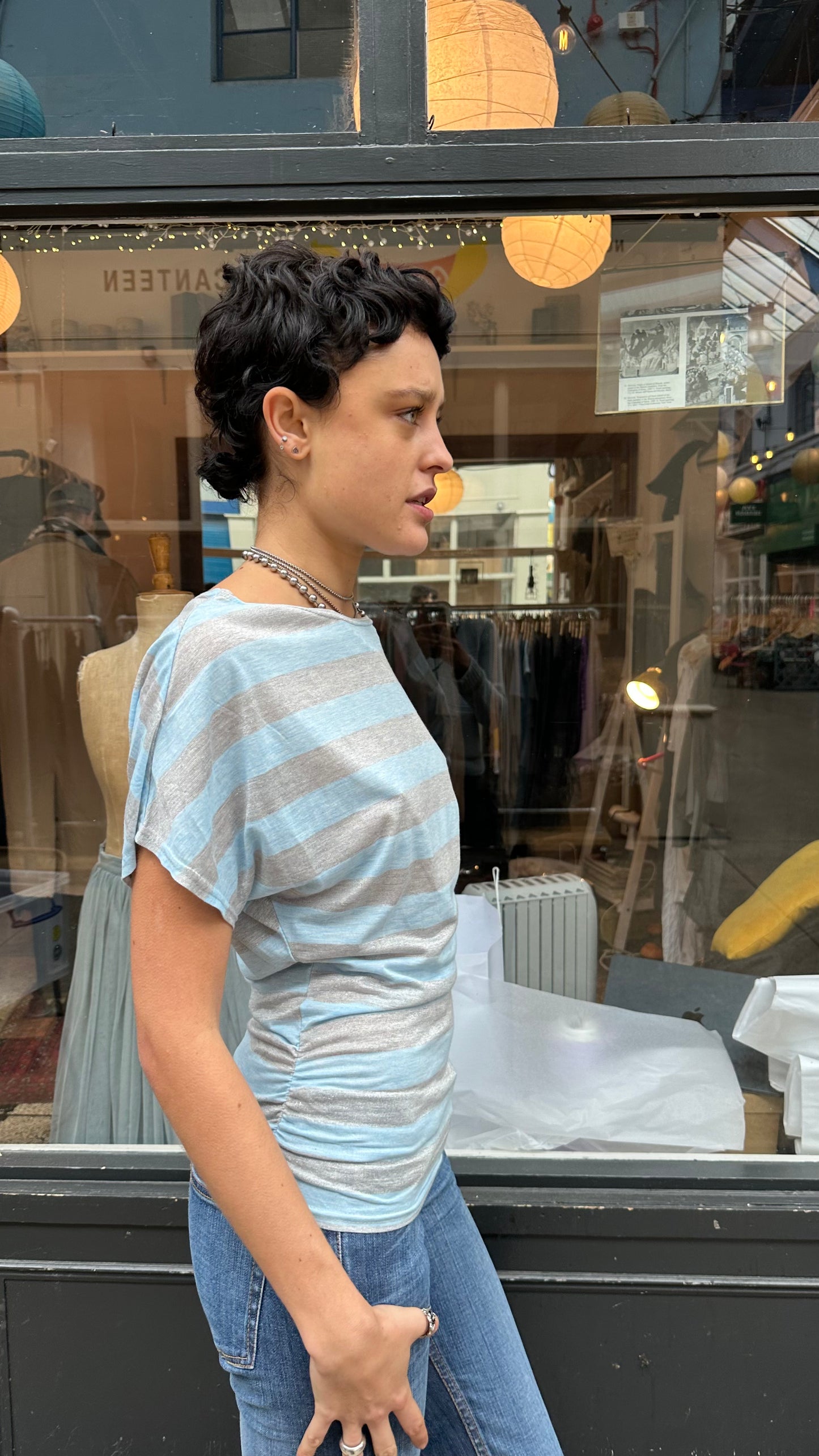Blue and silver striped top