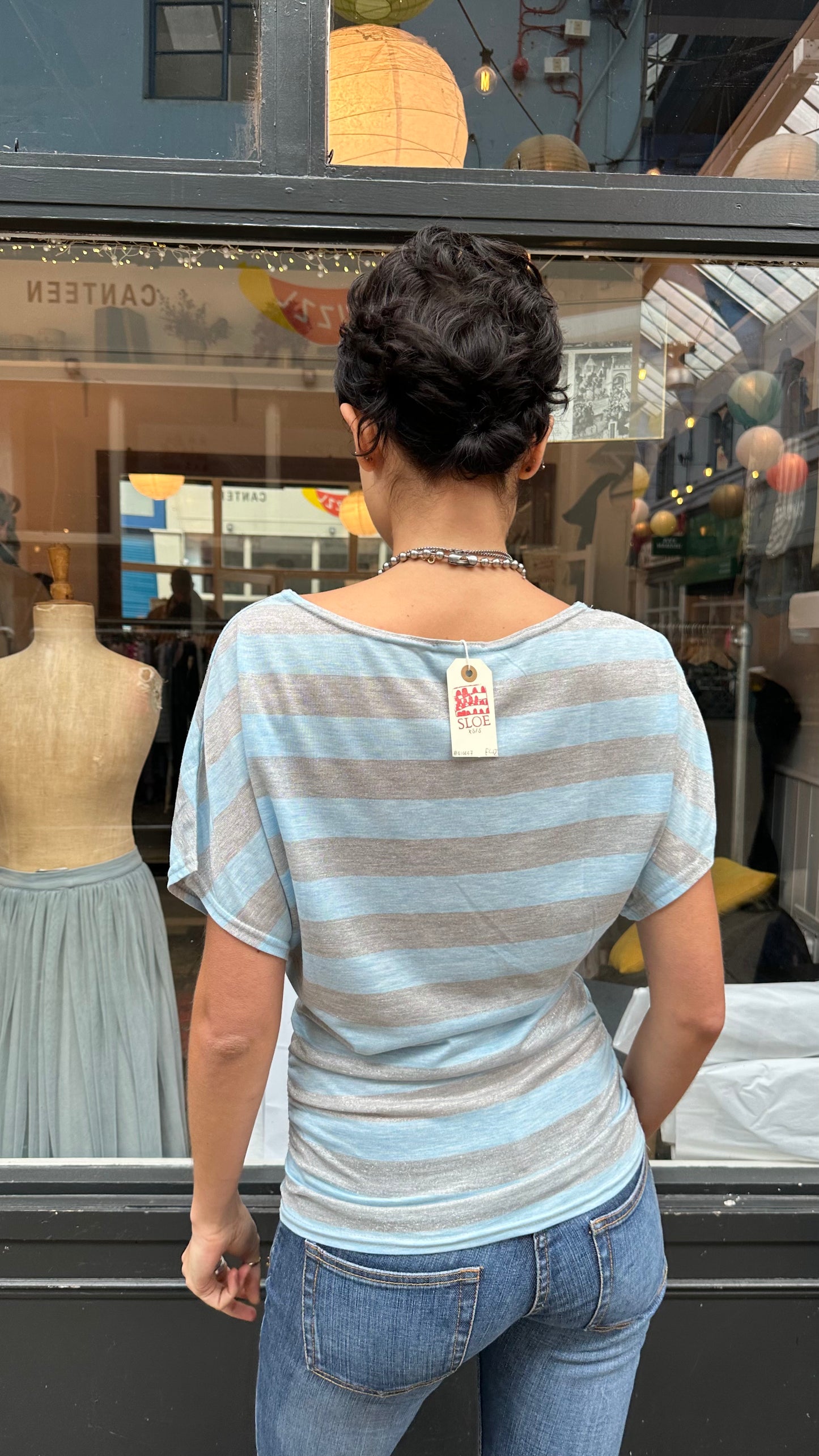 Blue and silver striped top