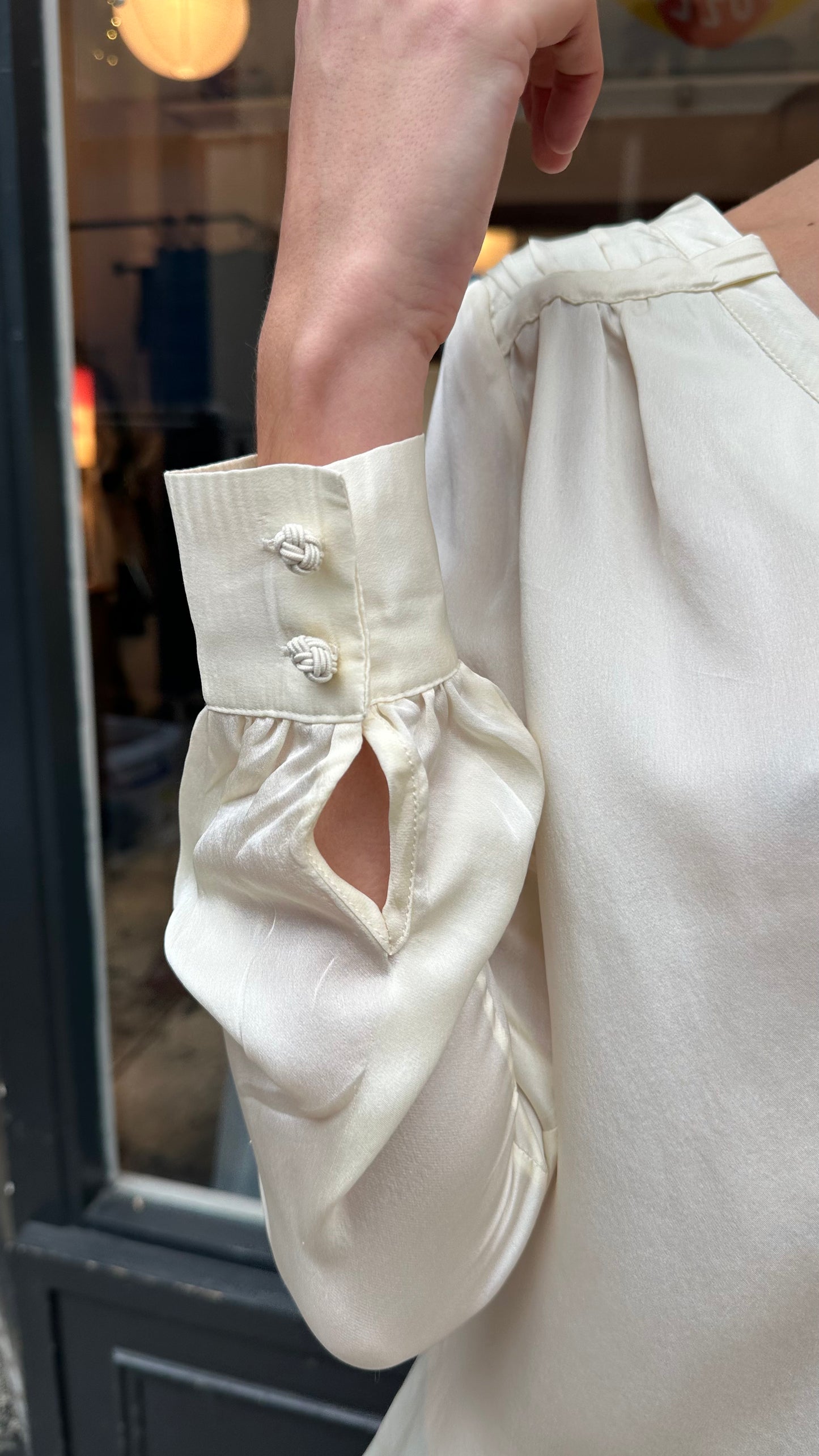 Cream silk blouse