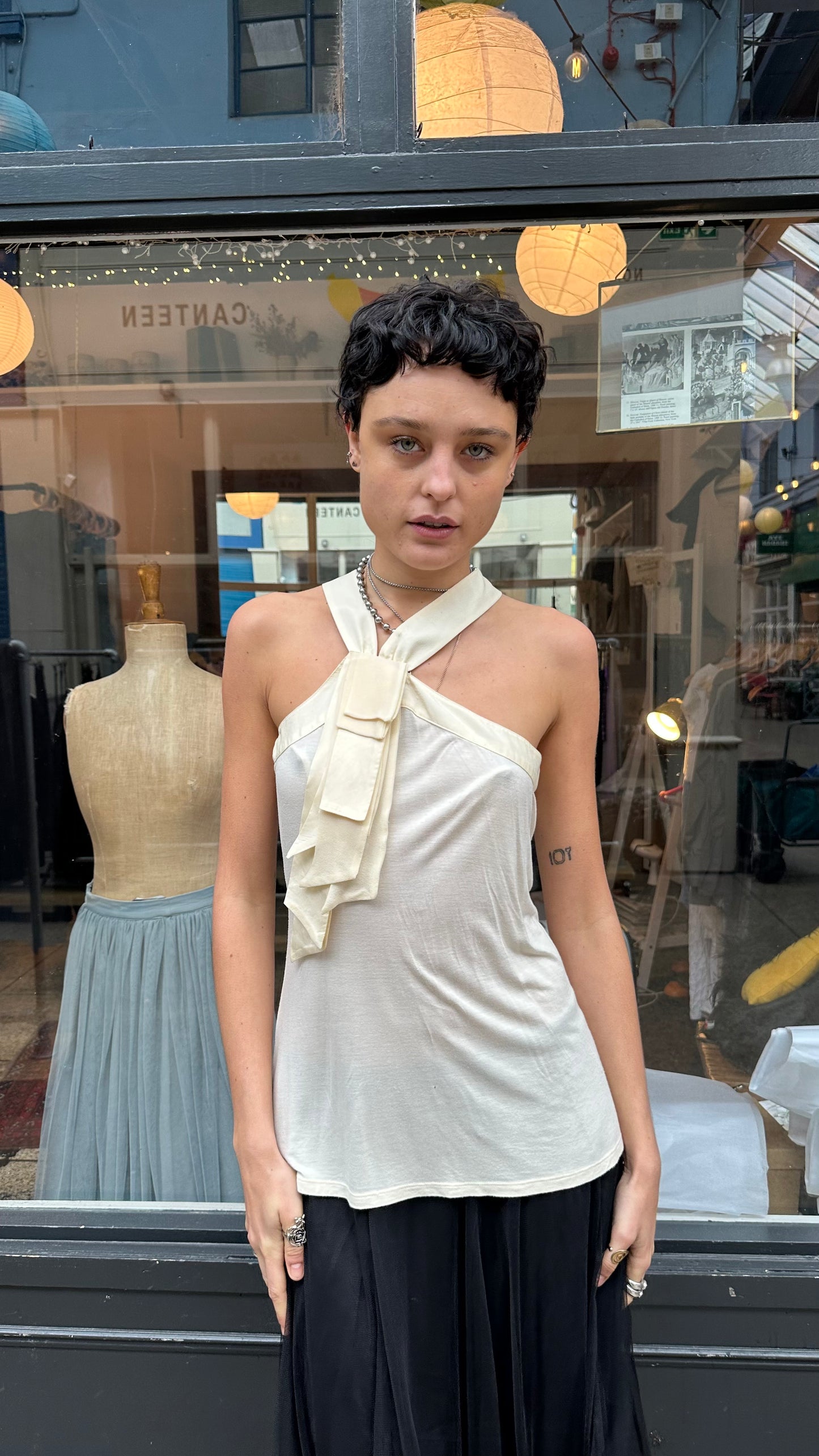 Asymmetric high neck top