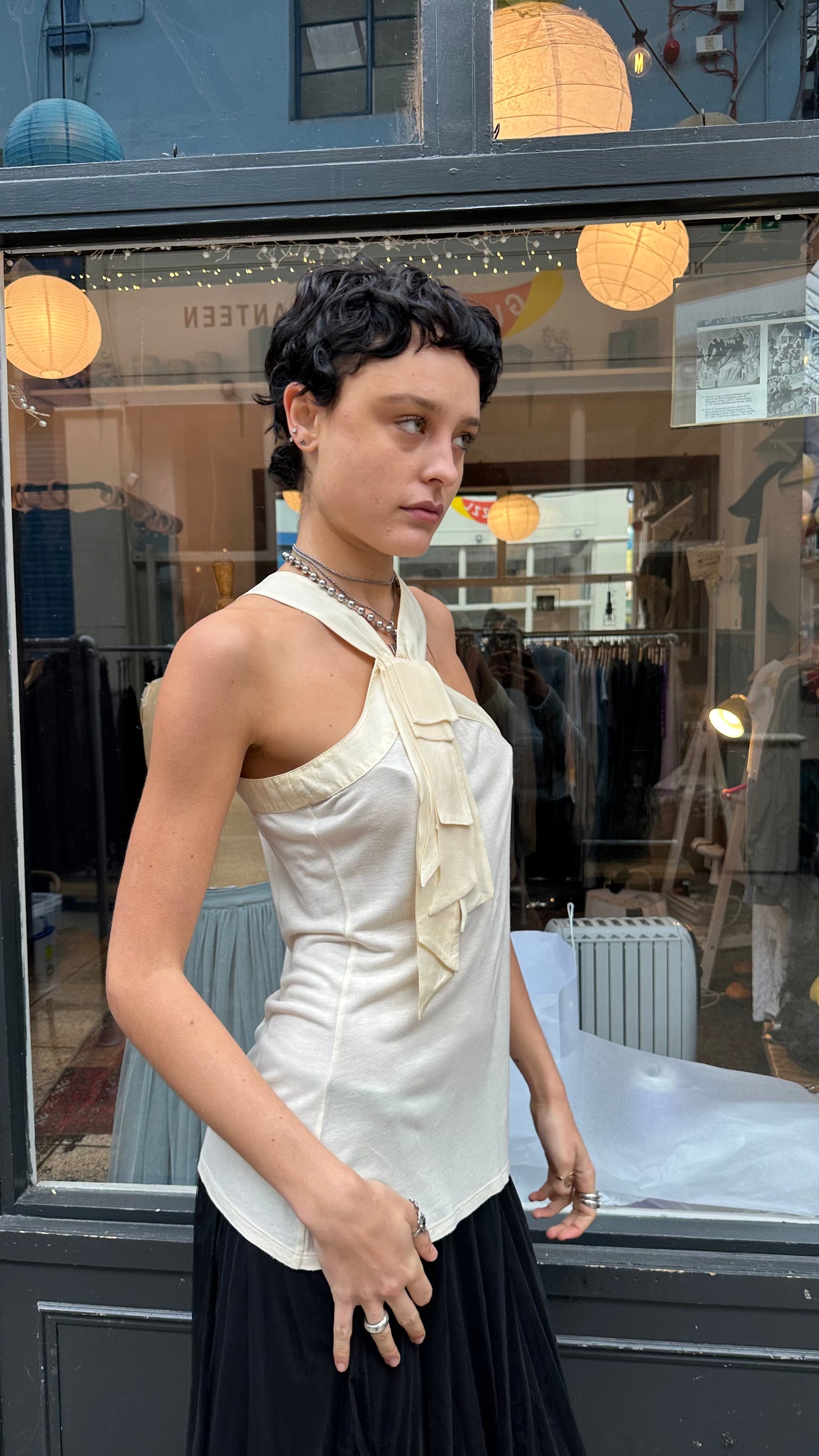 Asymmetric high neck top