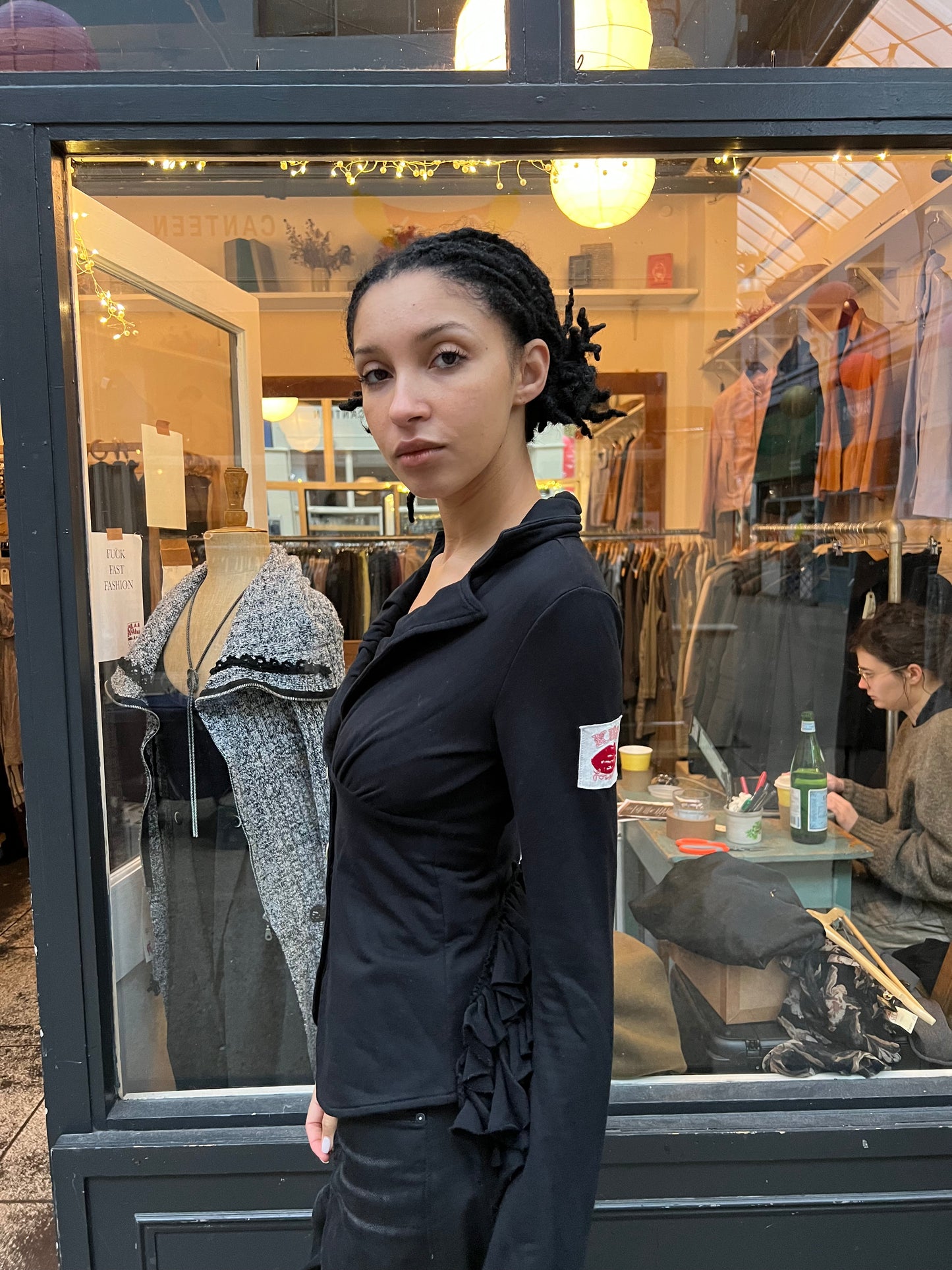 Cotton jacket with bustle
