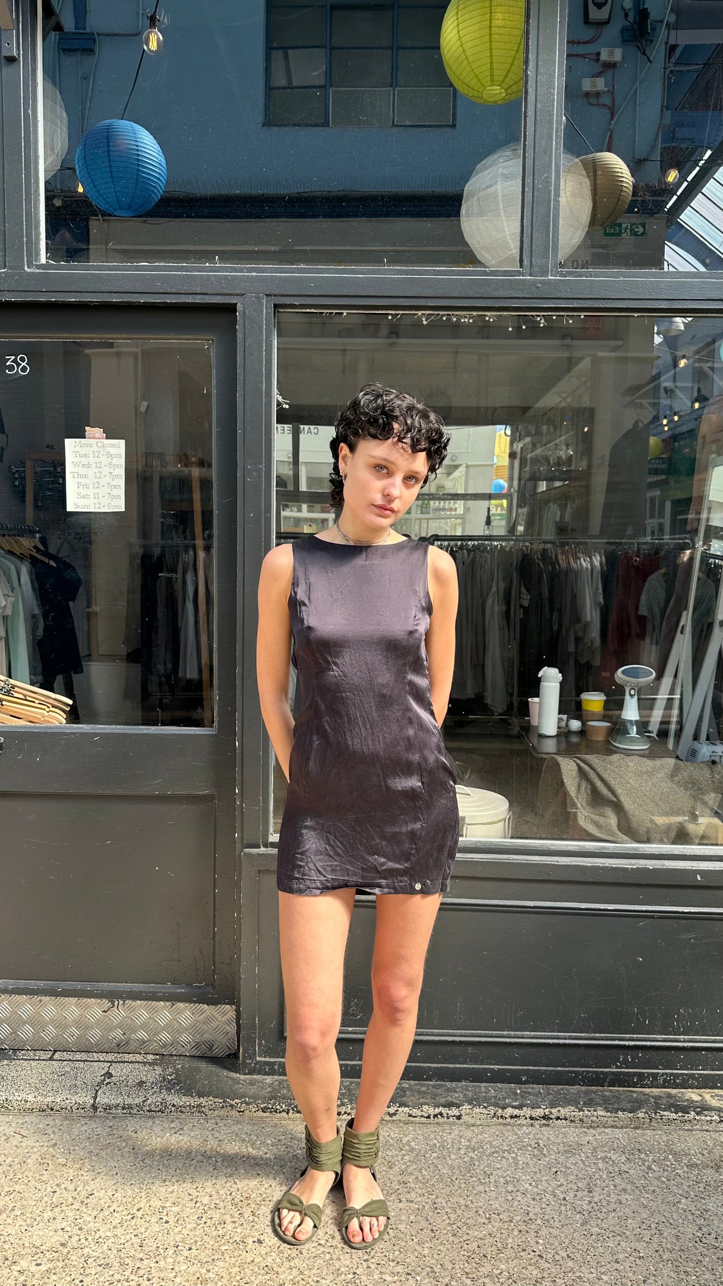 Black silky open back mini dress