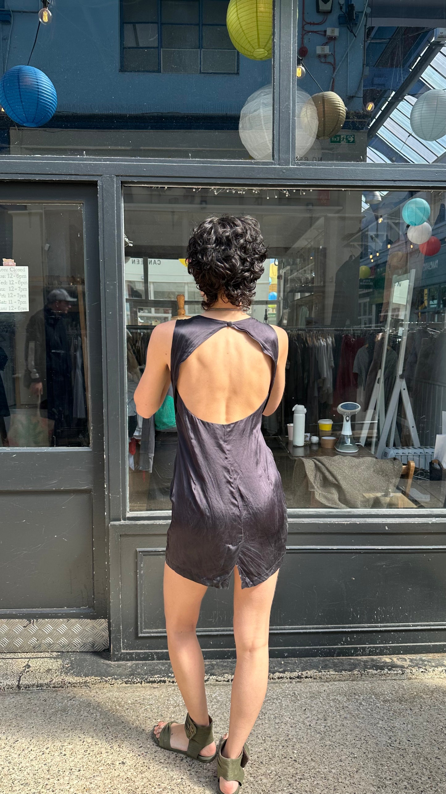Black silky open back mini dress