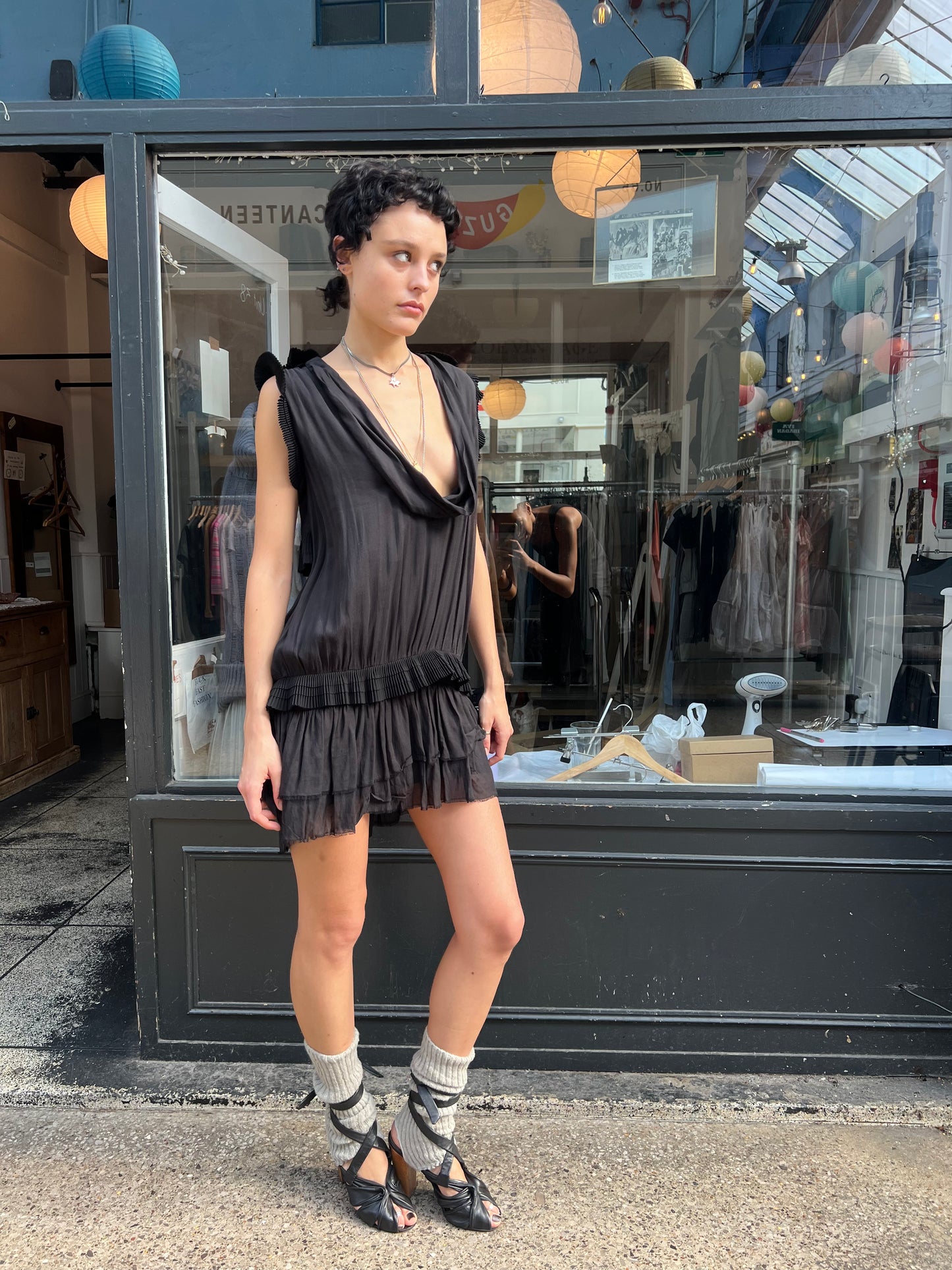 Black mini dress with pleated details